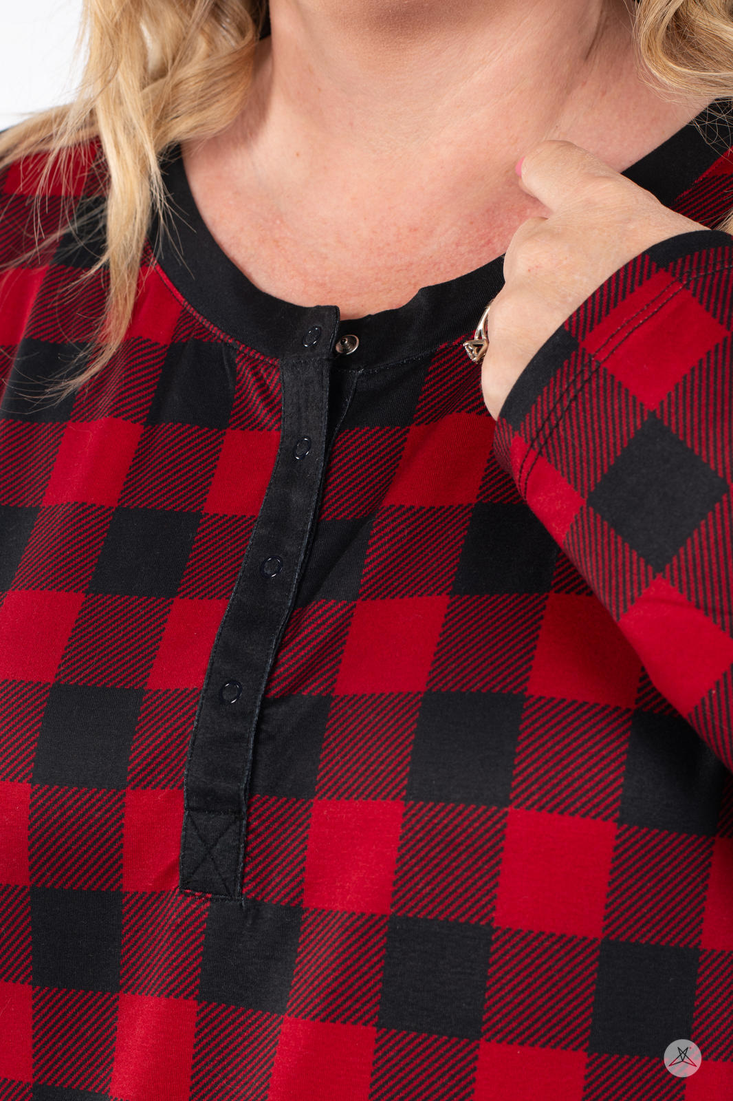 Close-up of SweetTops Henley Sleep Shirt neckline in red and black buffalo plaid with button detailing