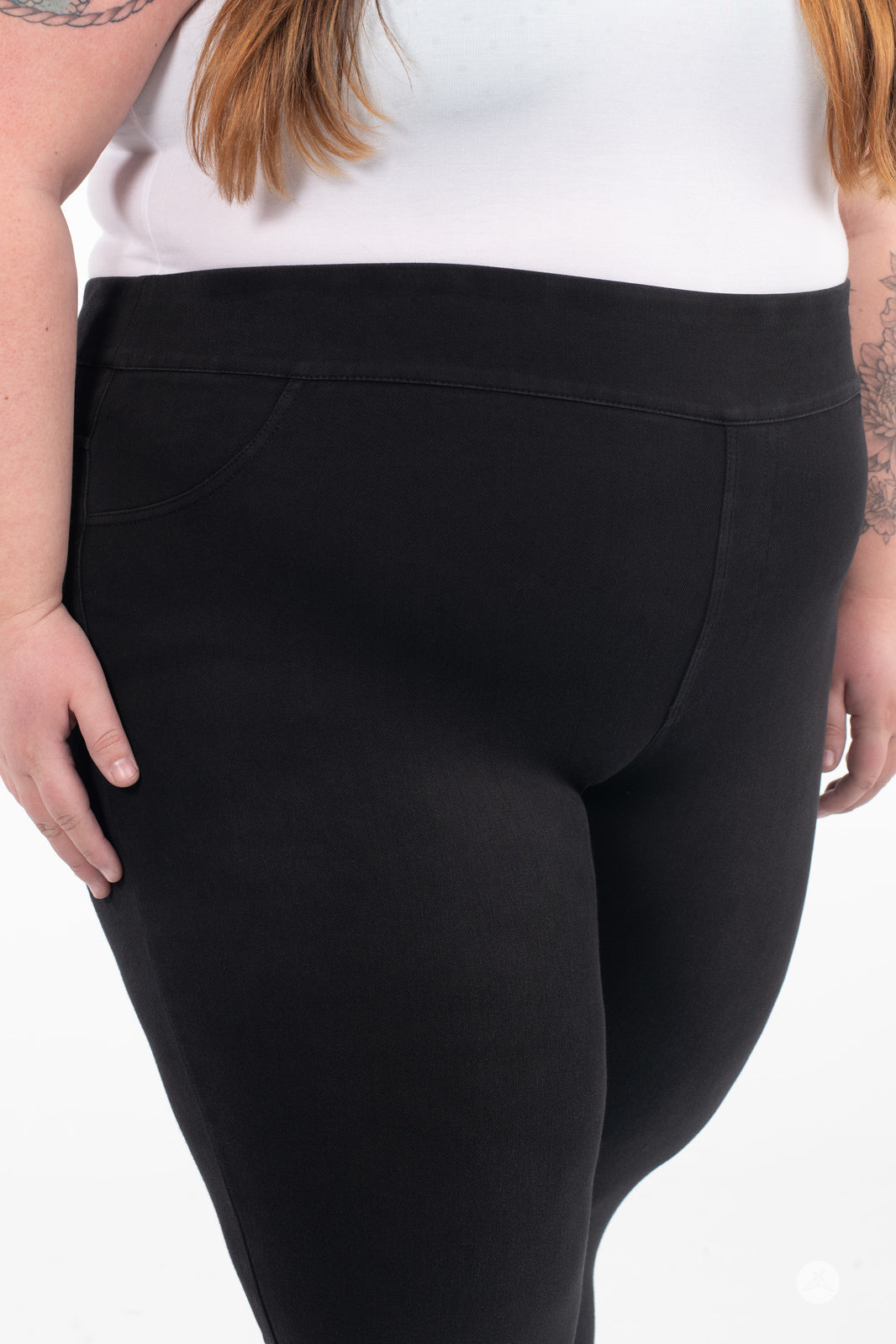 Close-up of SweetLegs Denim High-Waisted Pocket Leggings in black showing a smooth, comfortable fit on plus-size model