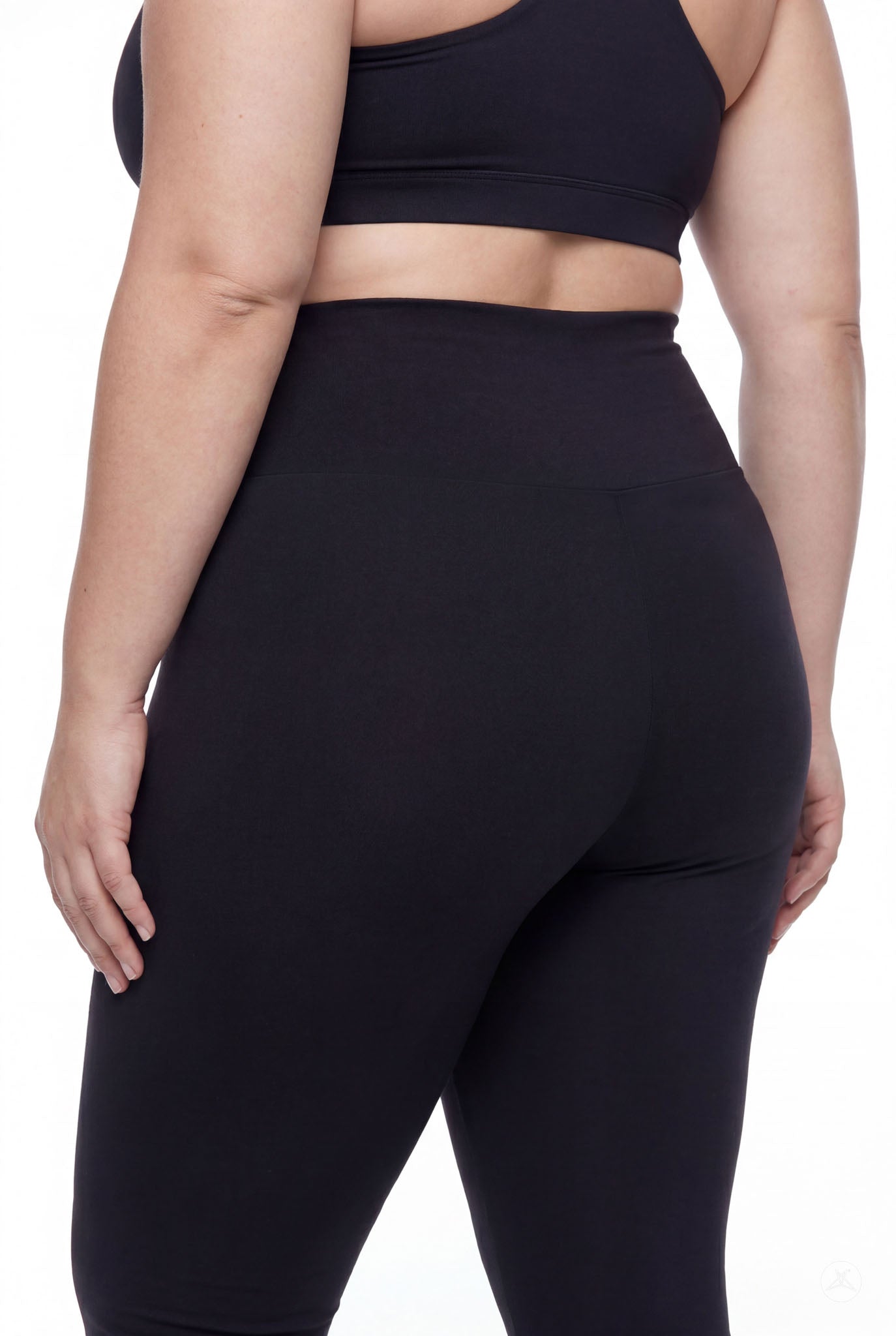Plus size woman wearing SweetLegs Black High-Waisted Crops with smooth stretch fabric and high-rise waistband rear view