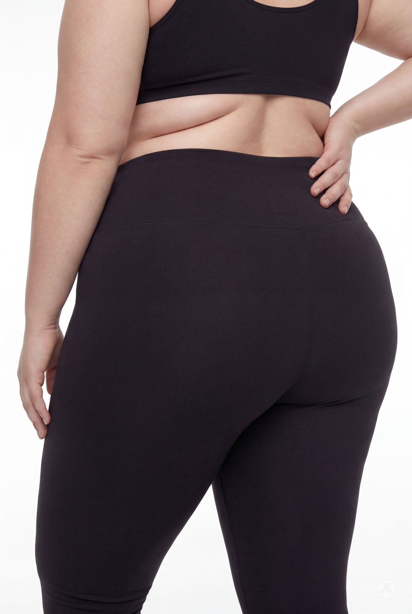 Plus size woman wearing SweetLegs Black High-Waisted Crops with smooth fitted fabric and signature wide waistband rear view