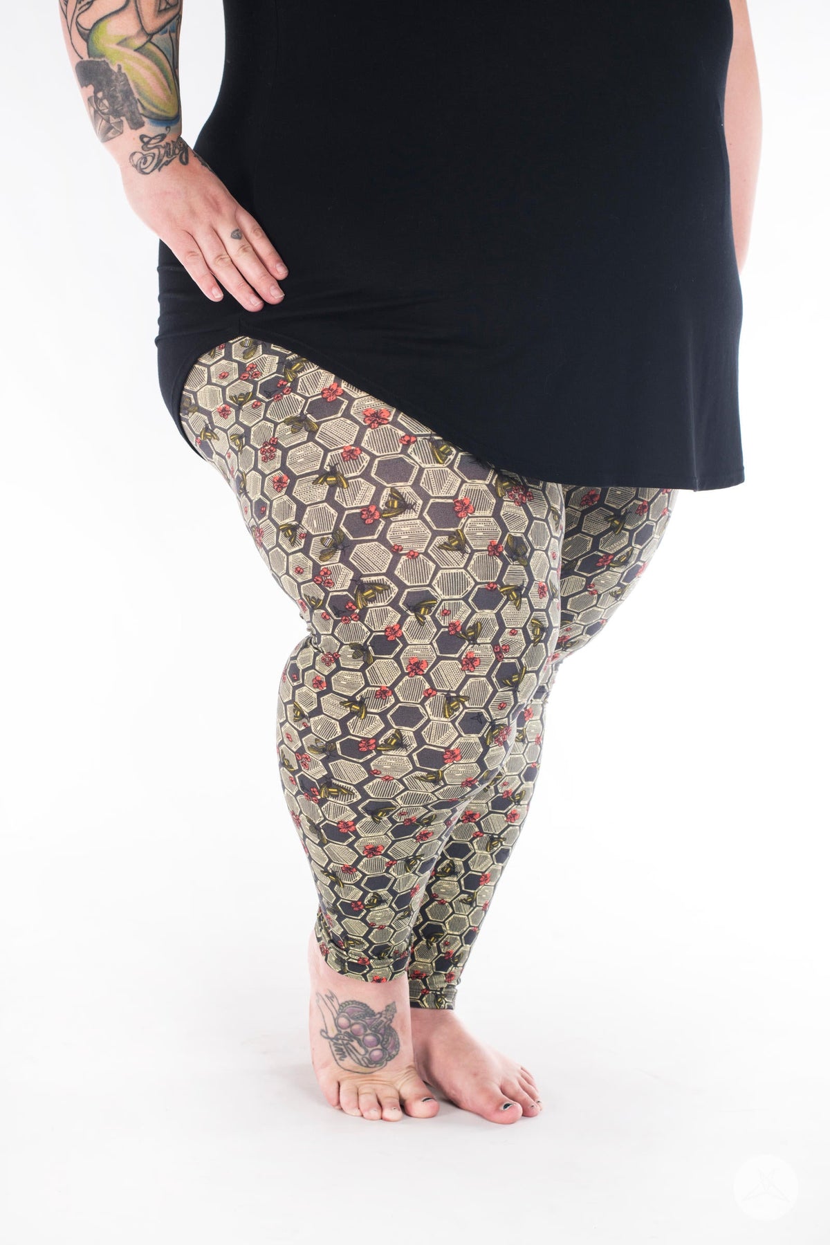 SweetLegs Vault - Signature Leggings with multicolor honeycomb pattern modeled with a black tunic