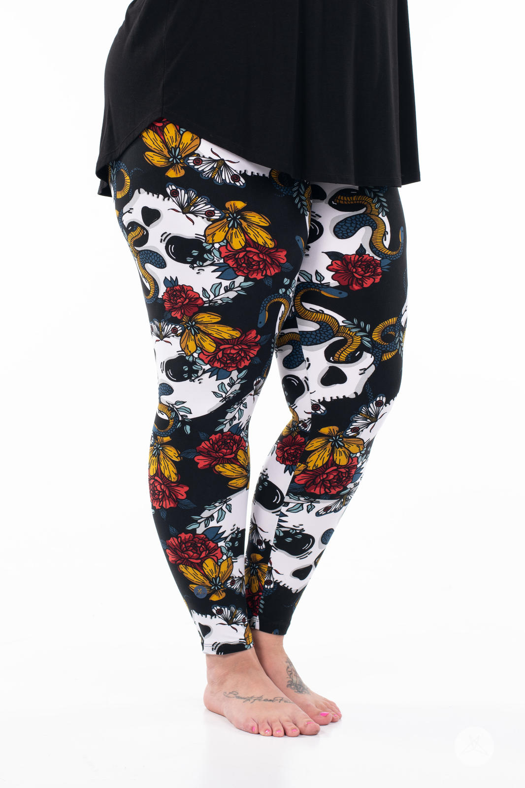 SweetLegs Vault - Signature Leggings with skull and floral print modeled with a black tunic