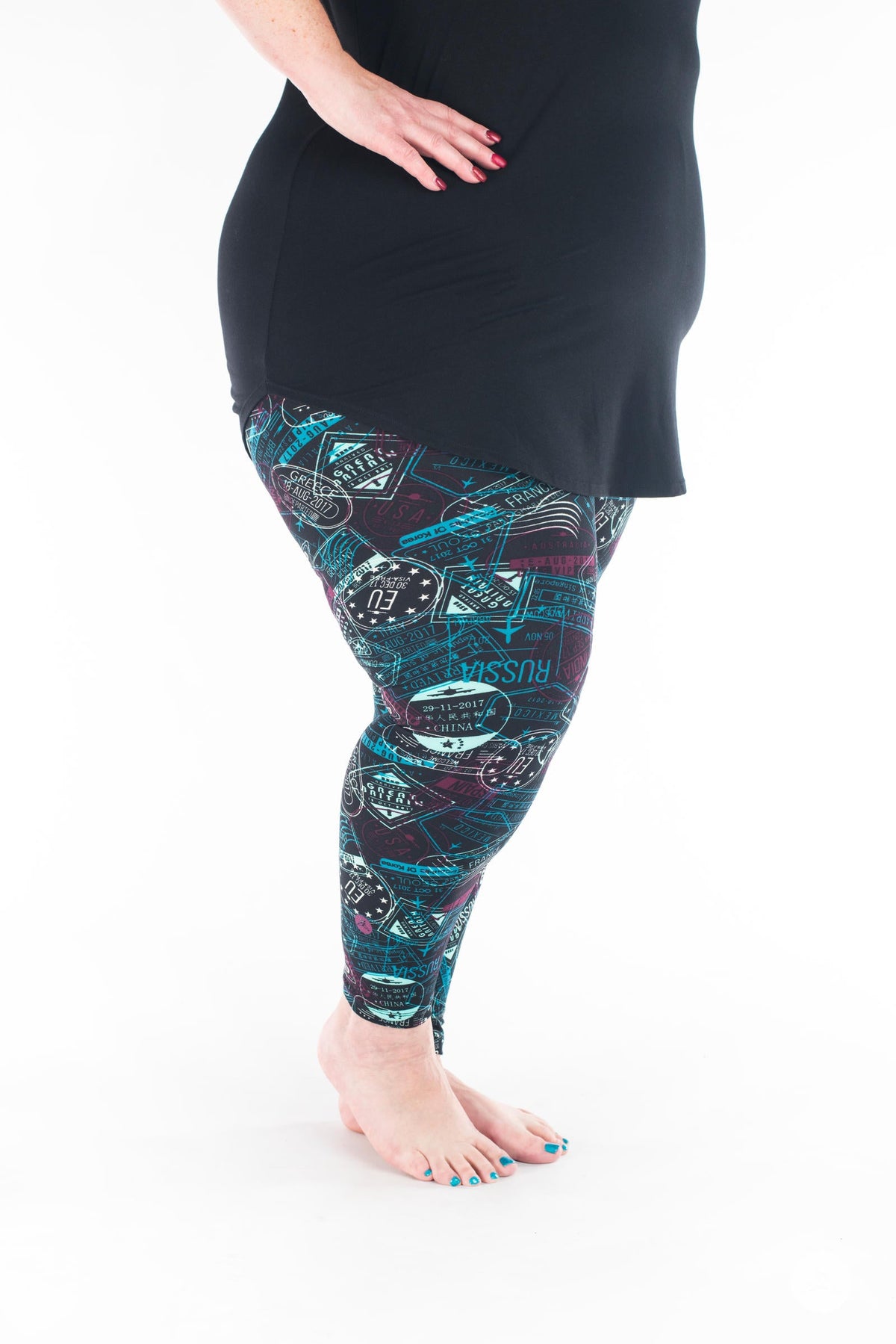 SweetLegs Vault - Signature Leggings with teal and white technical pattern modeled with a black tunic