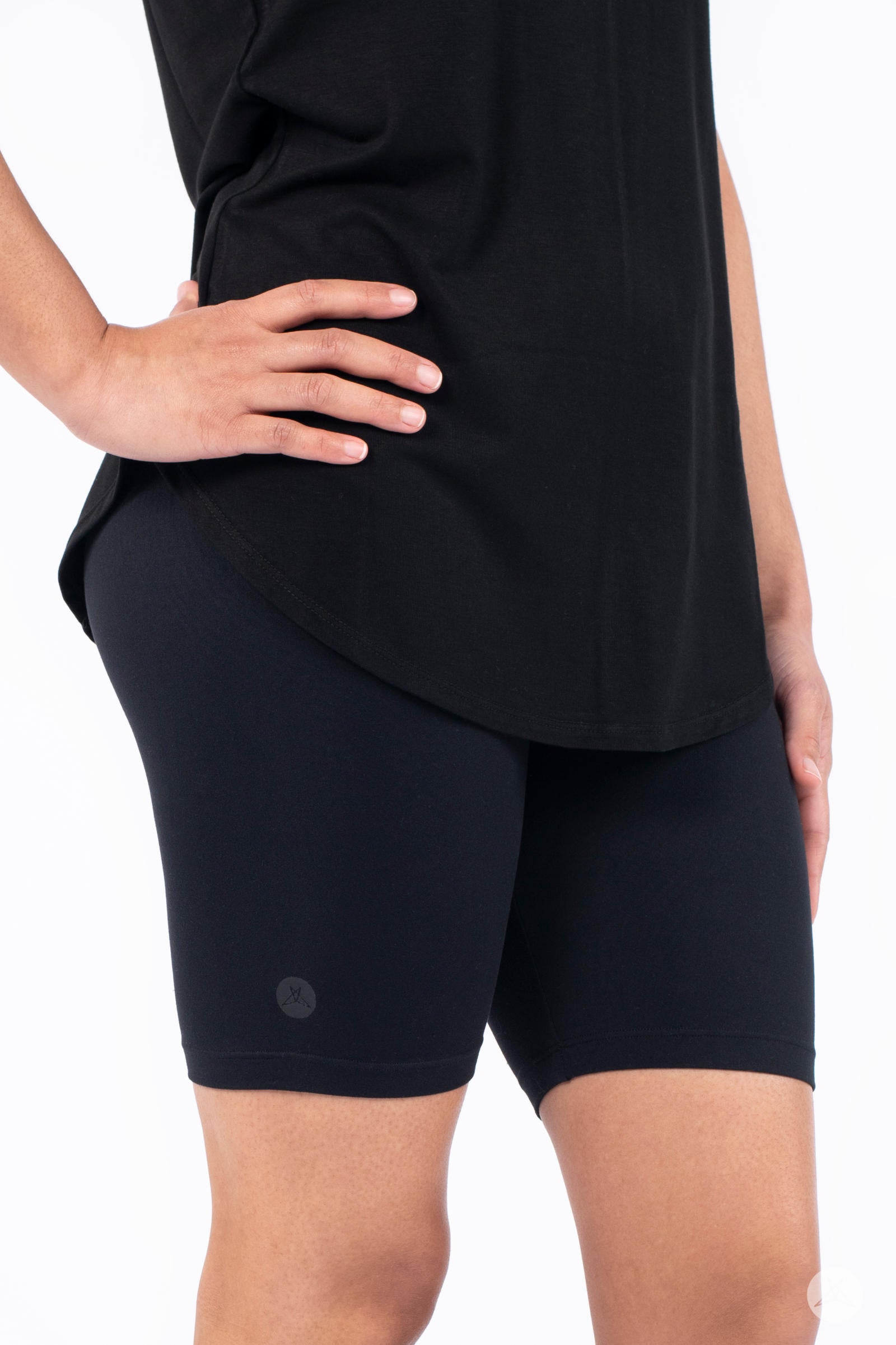 SweetLegs Black Biker Shorts with a cropped fit above the knee, designed for summer comfort and versatile layering