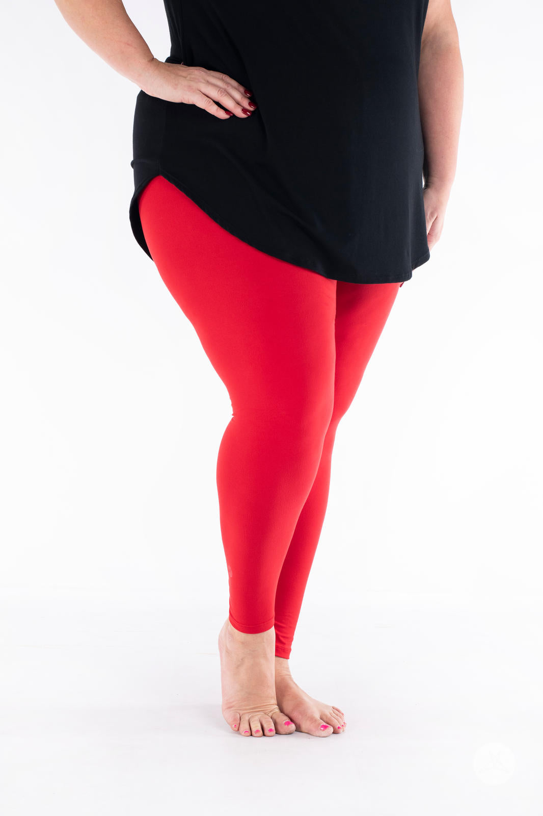 SweetLegs Vault - Signature Leggings in solid red modeled with a black tunic