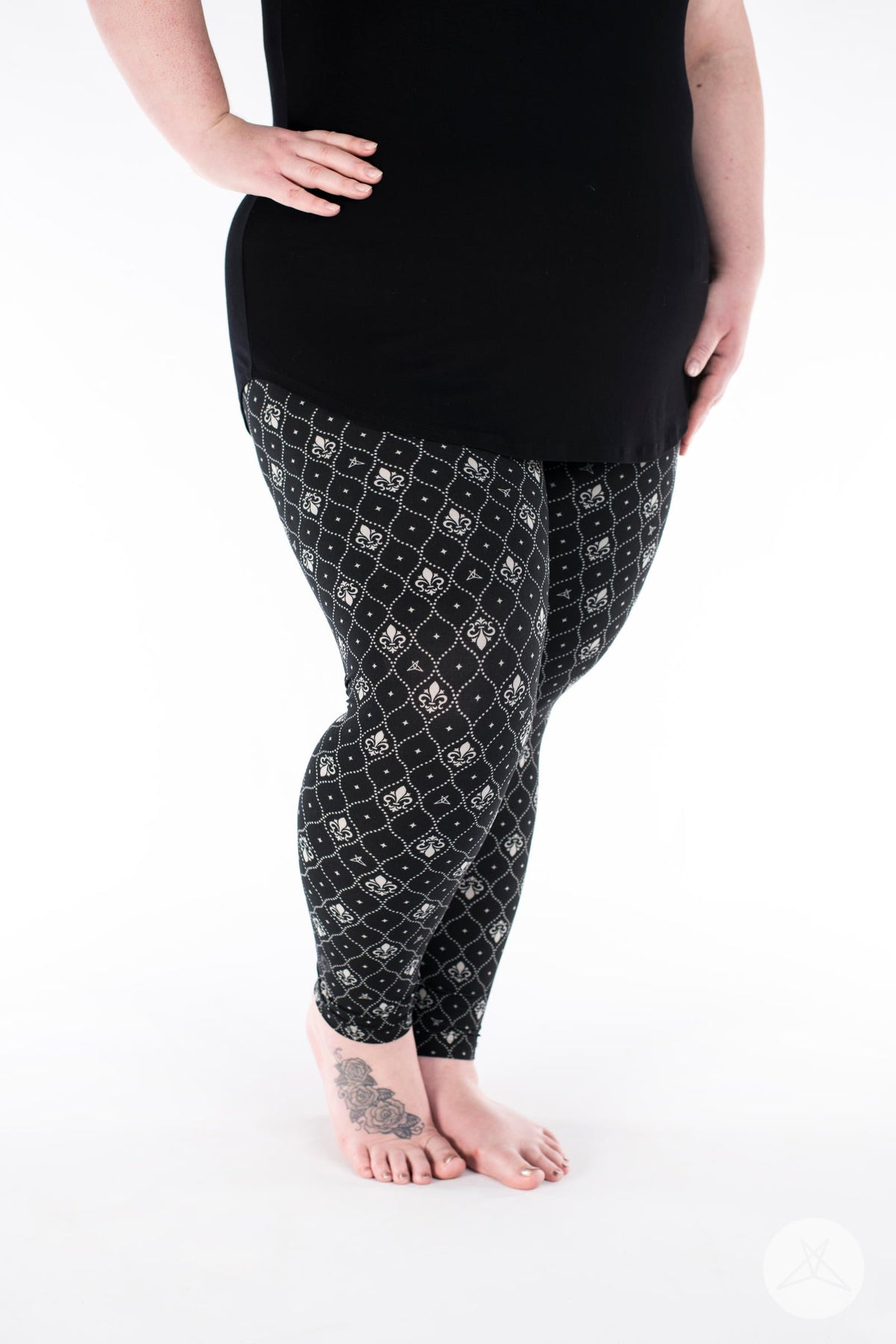 SweetLegs Vault - Signature Leggings with black geometric diamond print modeled with a black tunic