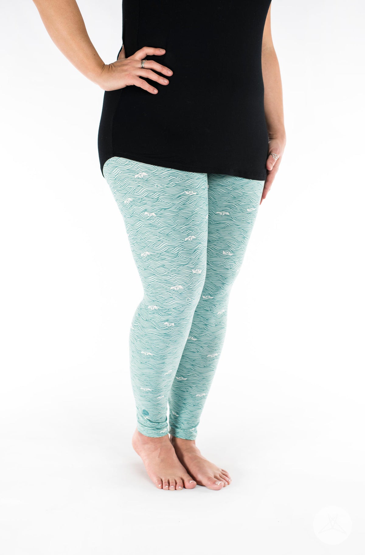 SweetLegs Vault - Signature Leggings in light aqua textured pattern modeled with a black tunic