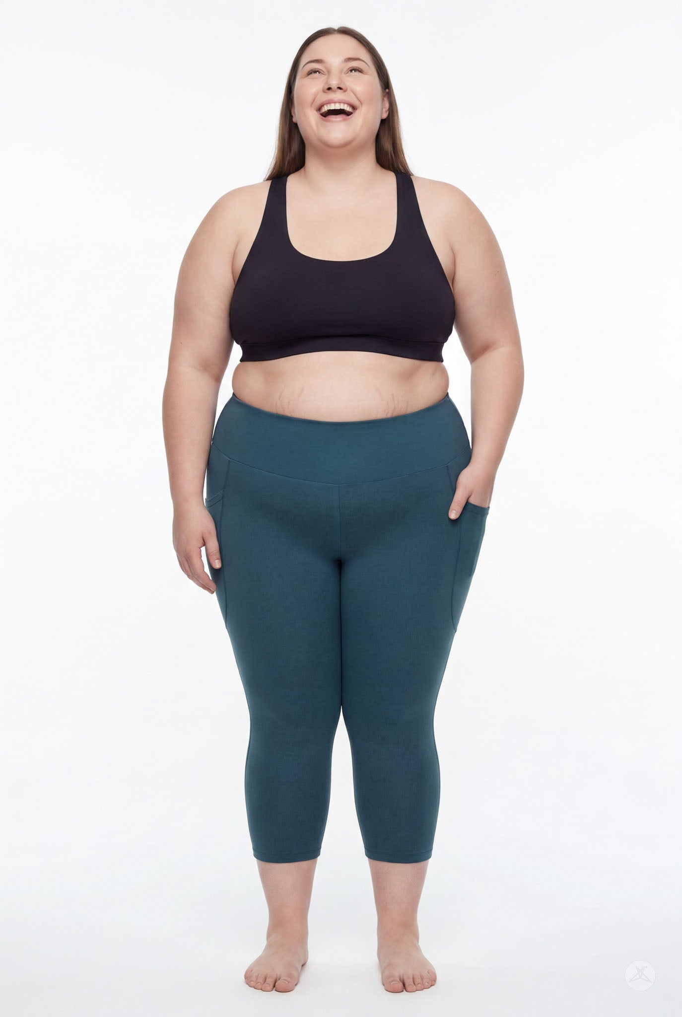 Plus size woman standing barefoot wearing SweetLegs Deep Teal High-Waisted Pocket Crops with hand in side pocket front view
