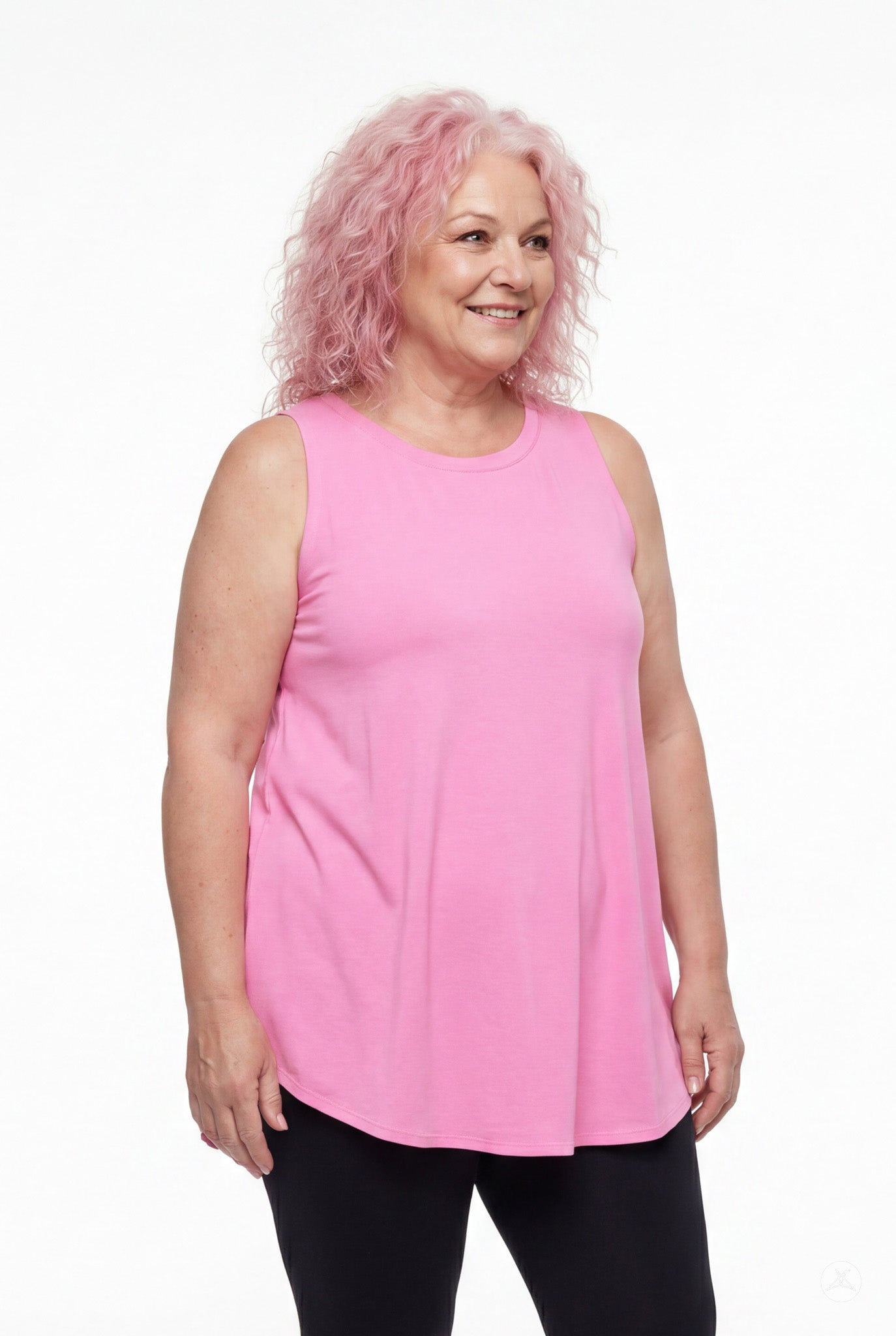 Smiling woman wearing SweetTops High Neck Swing Tank in pink with sleeveless cut and relaxed, flowing silhouette