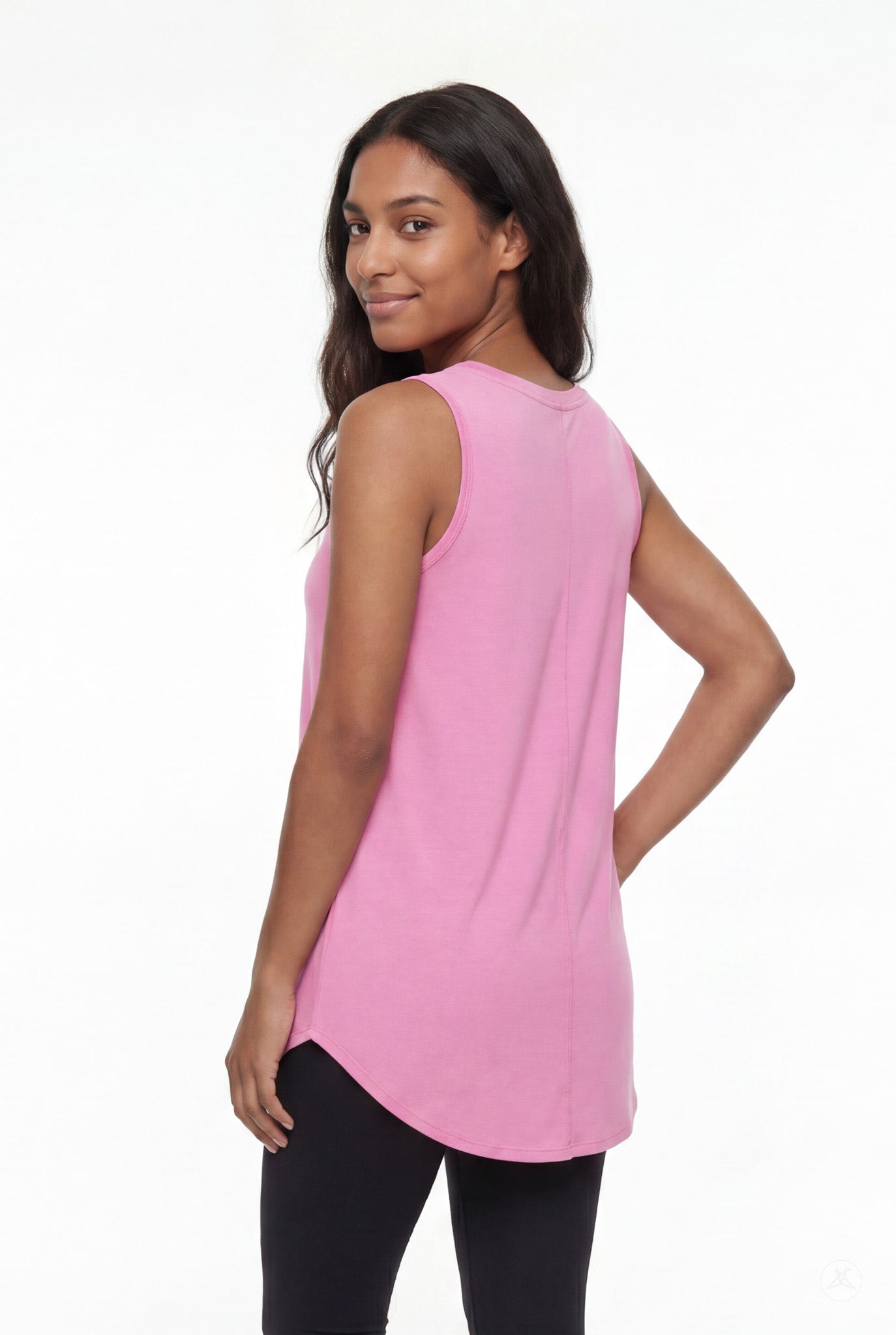 Woman wearing SweetTops High Neck Swing Tank in soft pink with sleeveless design and relaxed fit, shown from the back