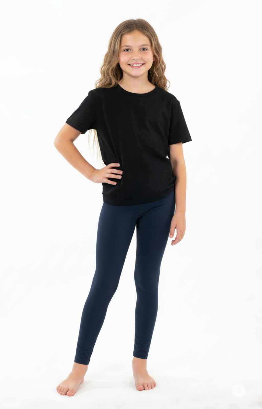 Smiling girl wearing SweetLegs Kids Dream Fleece Leggings in blue with a soft, comfortable fit for year-round warmth