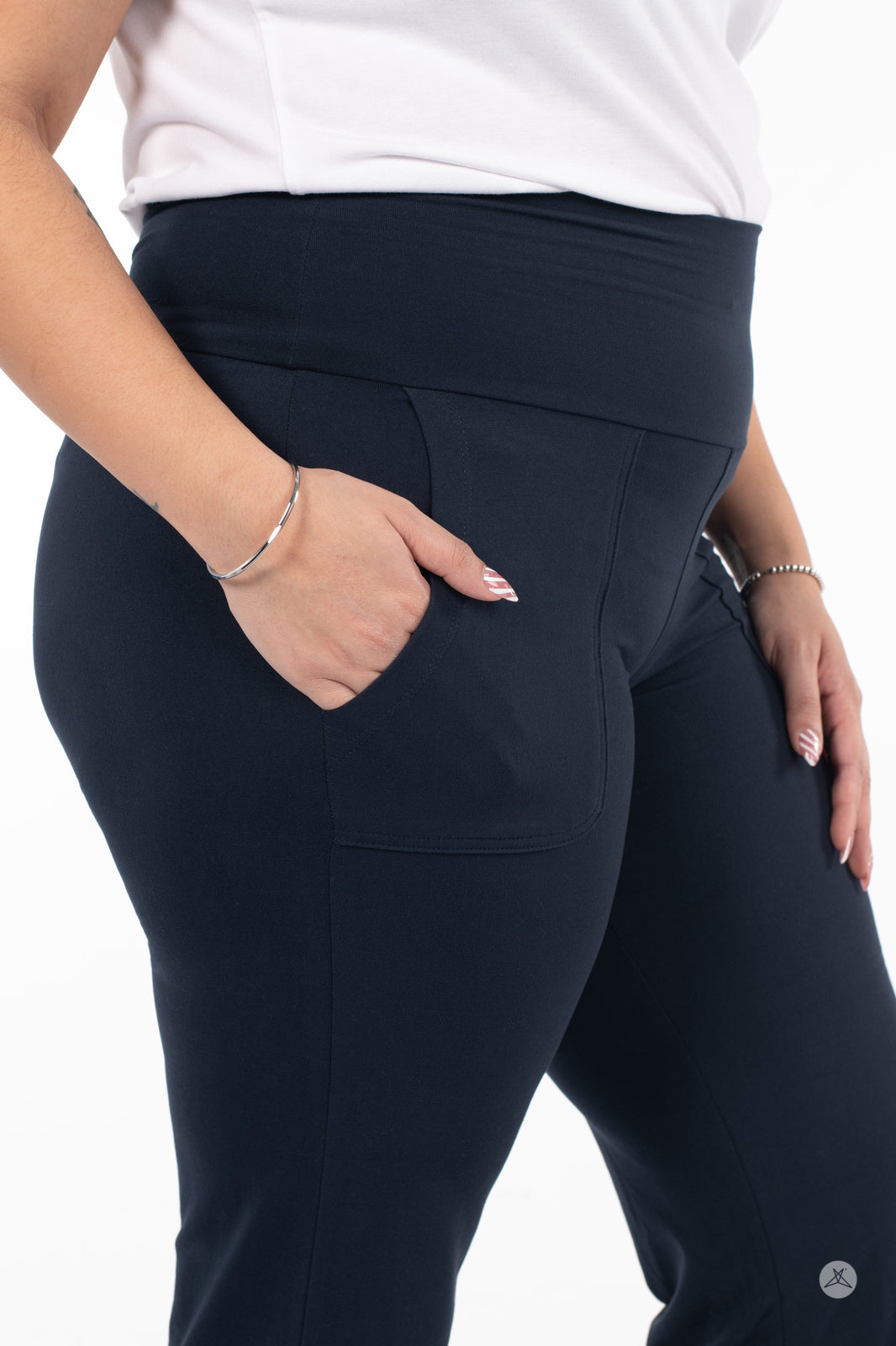 Close-up of person wearing black SweetLegs High-Waist Wide Leg Crops with side pocket and white top
