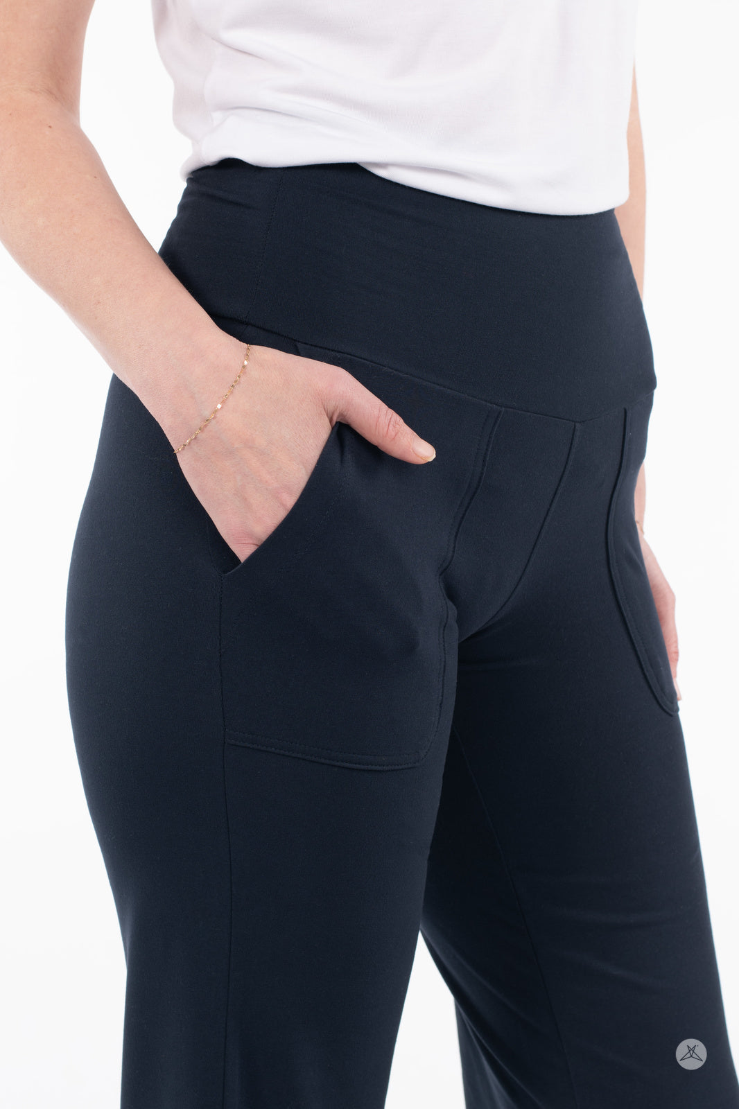 Close-up of woman wearing SweetLegs High-Waist Wide Leg Crops in black with side pockets and white top