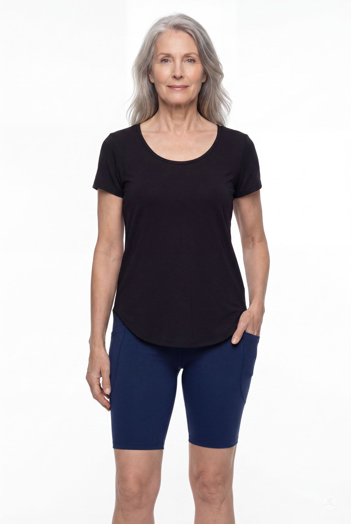 Plus size woman wearing SweetLegs Still Water Pocket Biker Shorts in navy with side pockets and signature waistband