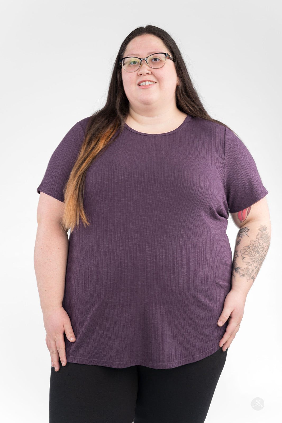 Plus-size woman wearing purple Soft Ribbed Tee by SweetLegs Canada with crew neck and short sleeves, front view