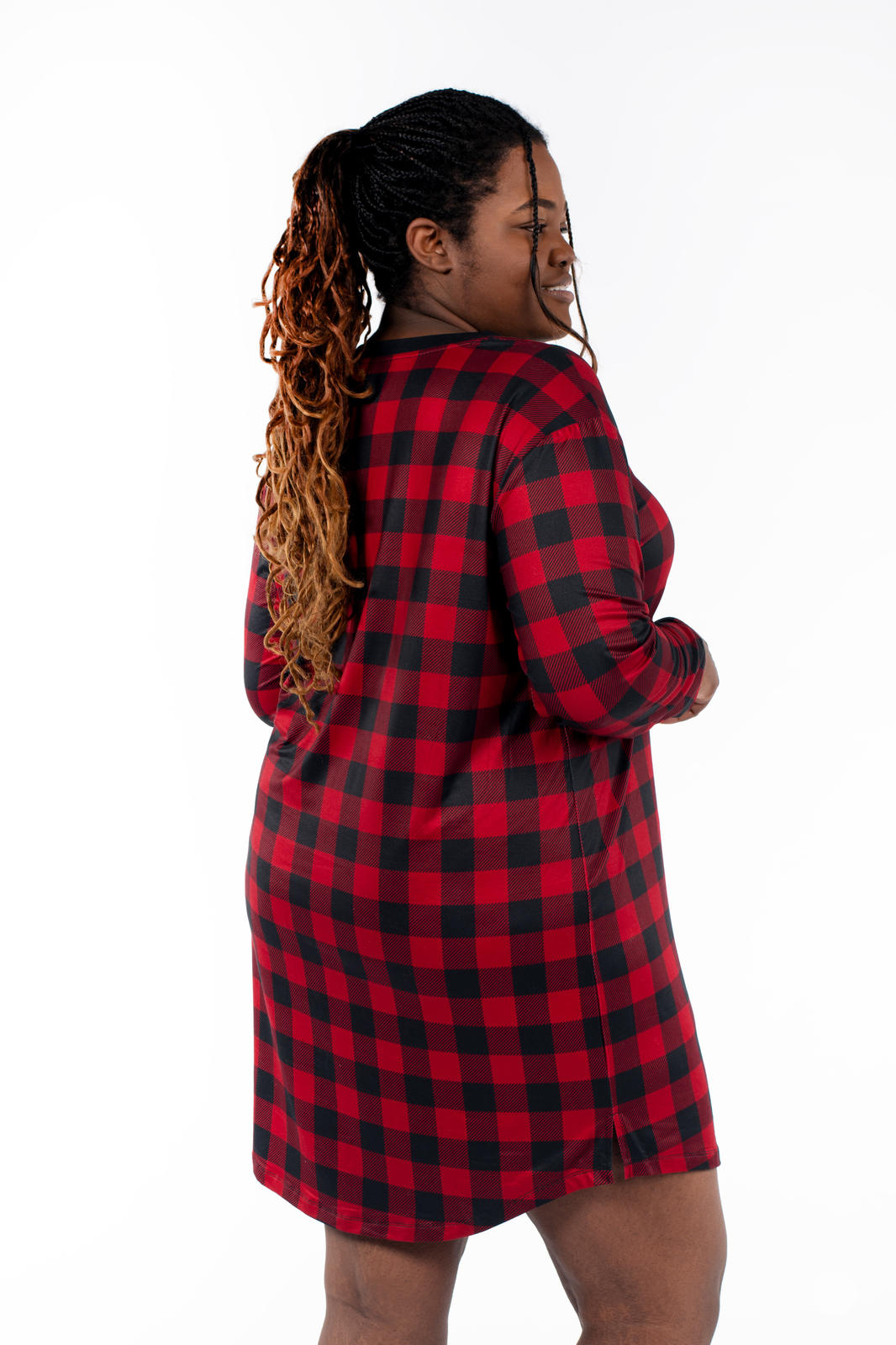 Plus size model wearing SweetTops Henley Sleep Shirt in red and black buffalo plaid with relaxed fit back view