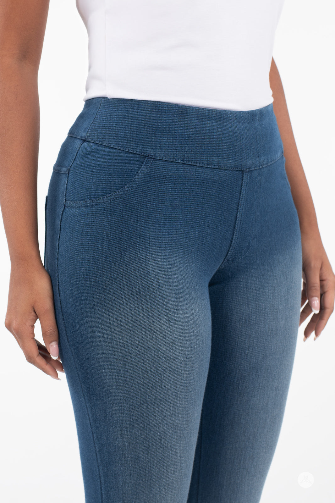 Close-up of SweetLegs Denim High-Waisted Pocket Leggings in blue showing soft stretch fabric and front pocket detail