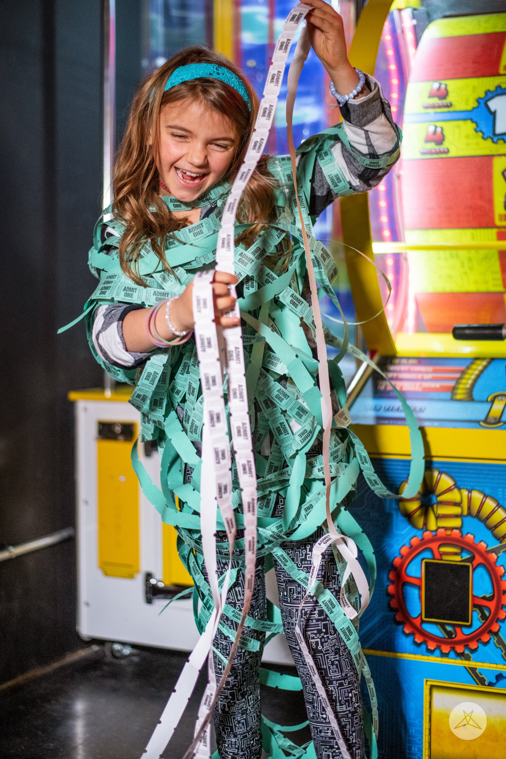 Child wearing SweetLegs Short Circuit Kids leggings with periwinkle and grey circuit print on black background