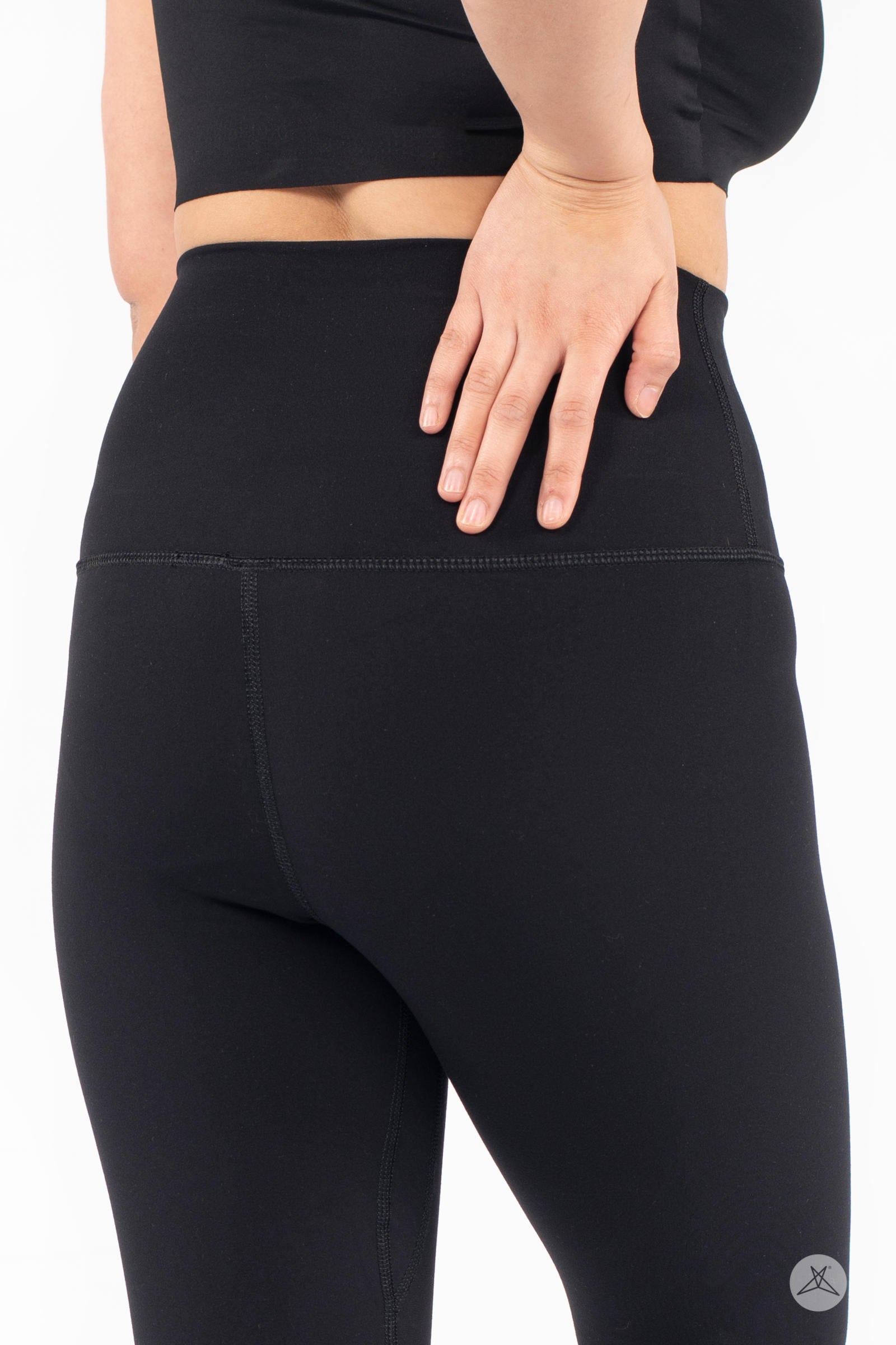Rear close-up of woman wearing black Free Motion Crops by Athleisure from SweetLegs collection