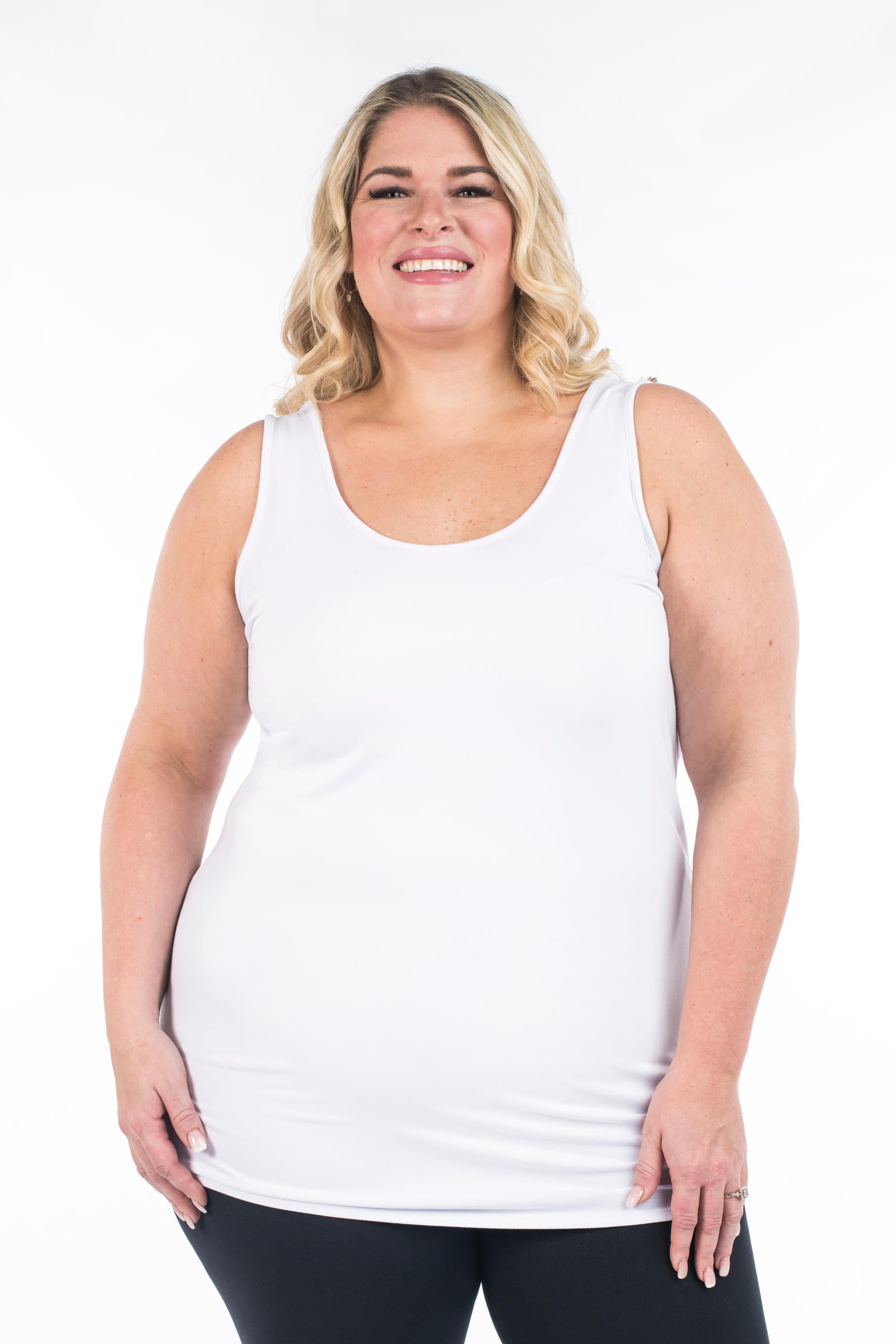 Smiling plus-size model wearing SweetLegs Canada Classic Layering Tank in white with a soft, flattering fit