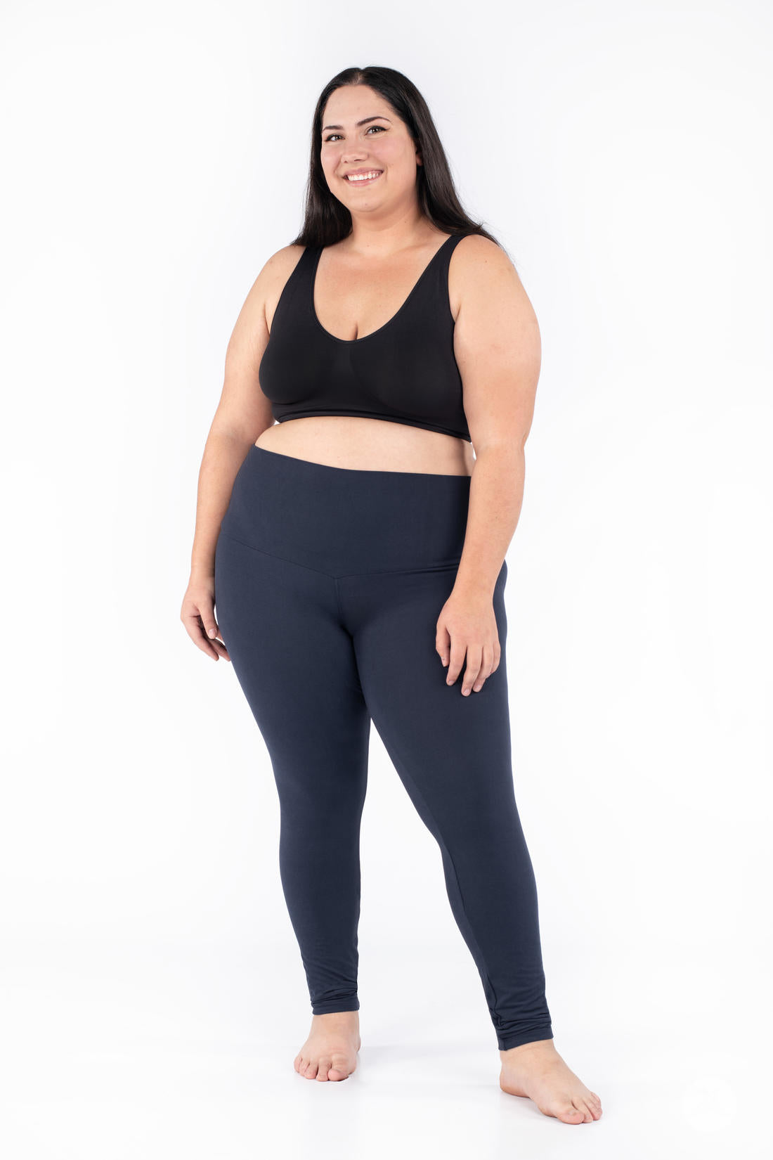 Plus-size model wearing SweetLegs Navy Wide Waistband Leggings with a smooth fit and supportive mid-rise waistband