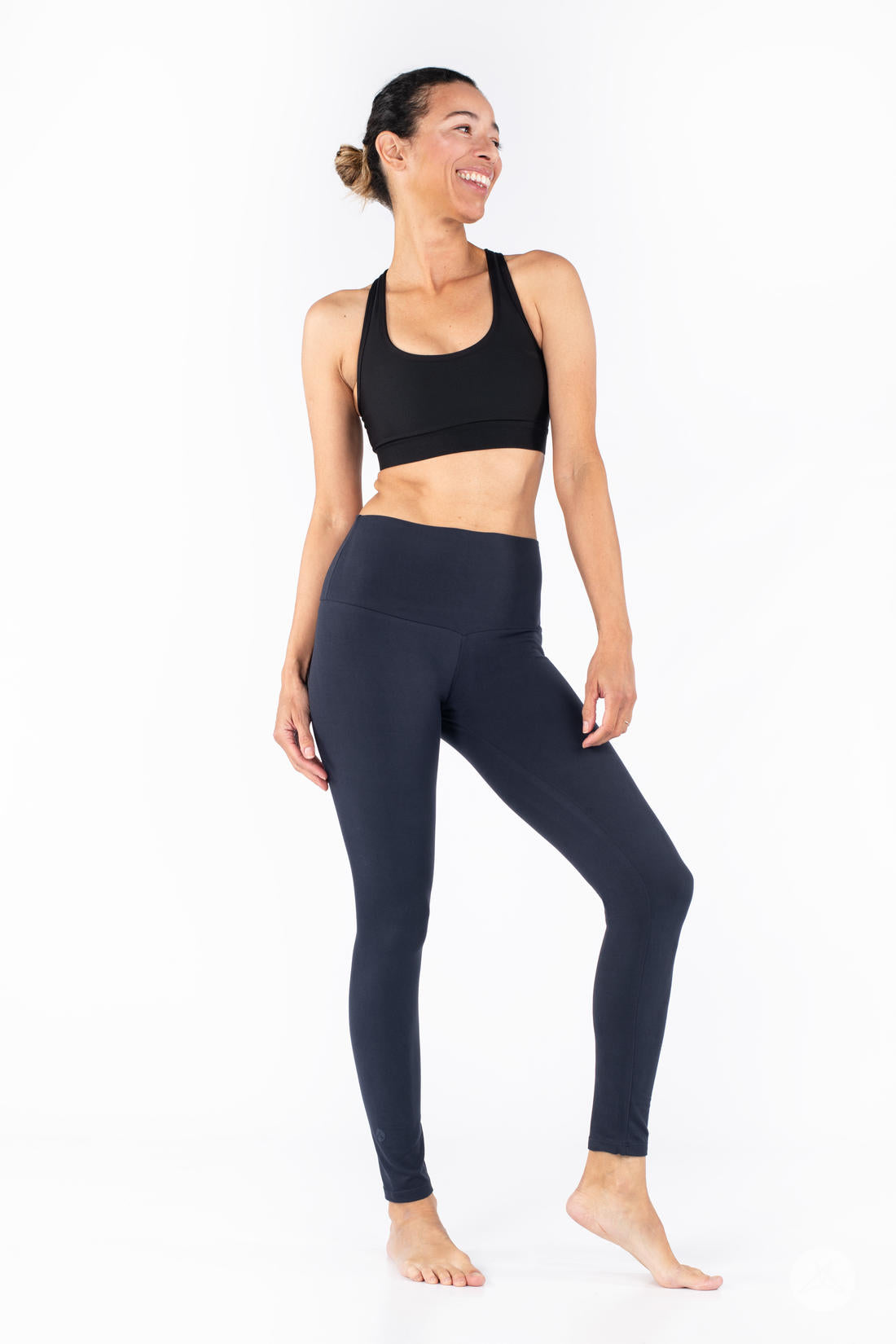 Slim model wearing SweetLegs Navy Wide Waistband Leggings with a mid-rise wide waistband and smooth stretchy fabric