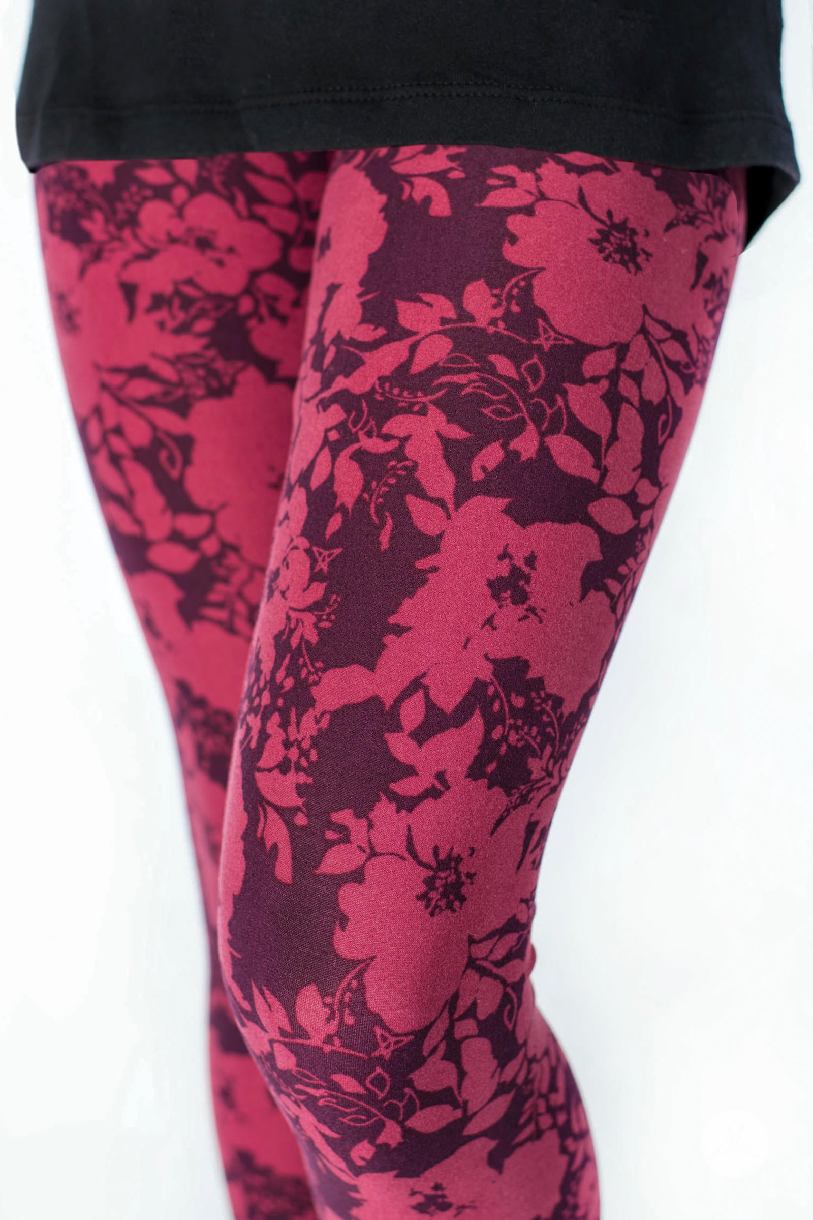 Close-up of SweetLegs Summer Blush Kids leggings featuring two-tone floral design in merlot and cherry hues