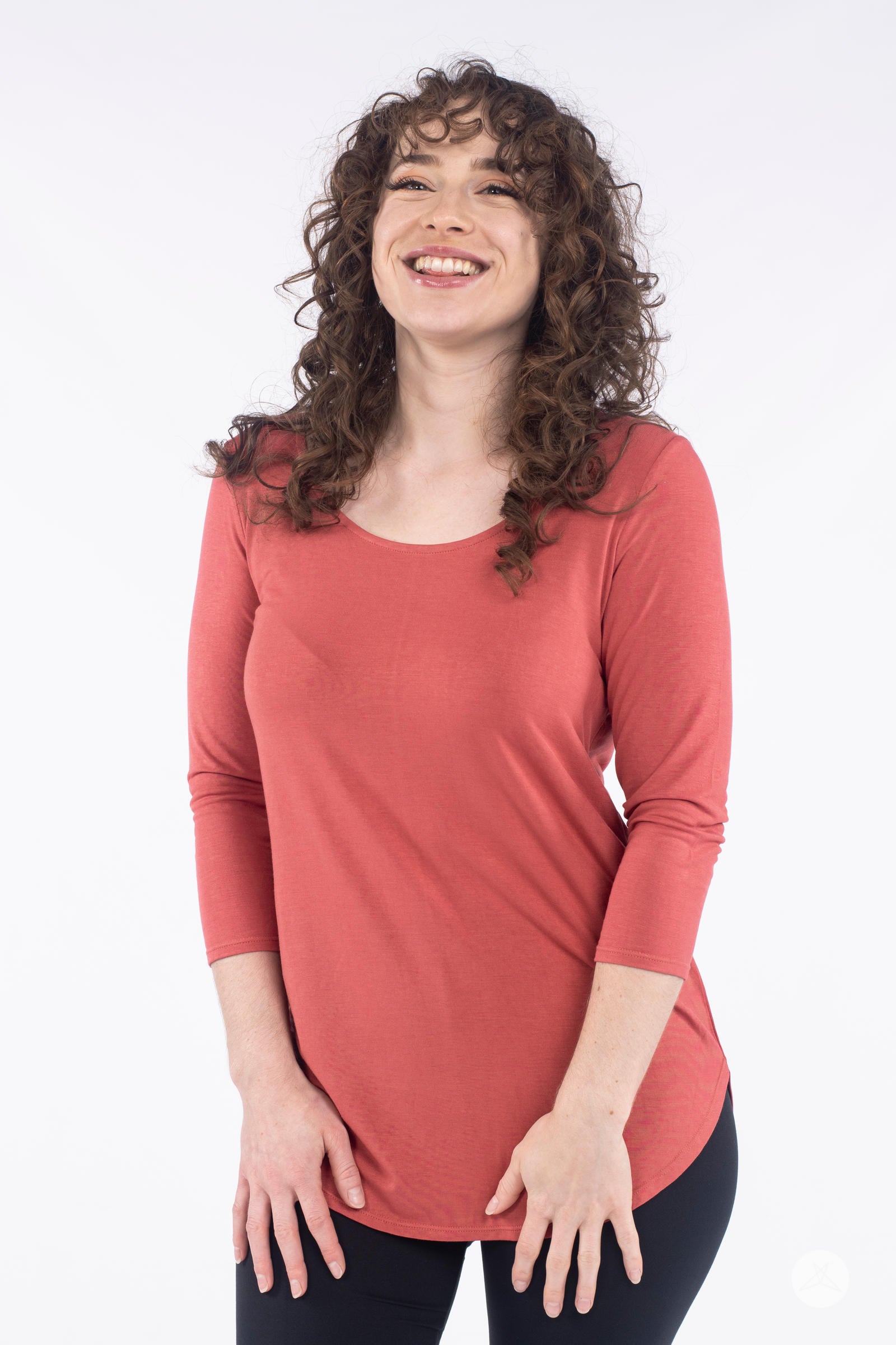 Classic 3/4 Tee by SweetLegs Canada in coral with scoop neck and fitted sleeves on smiling model front view