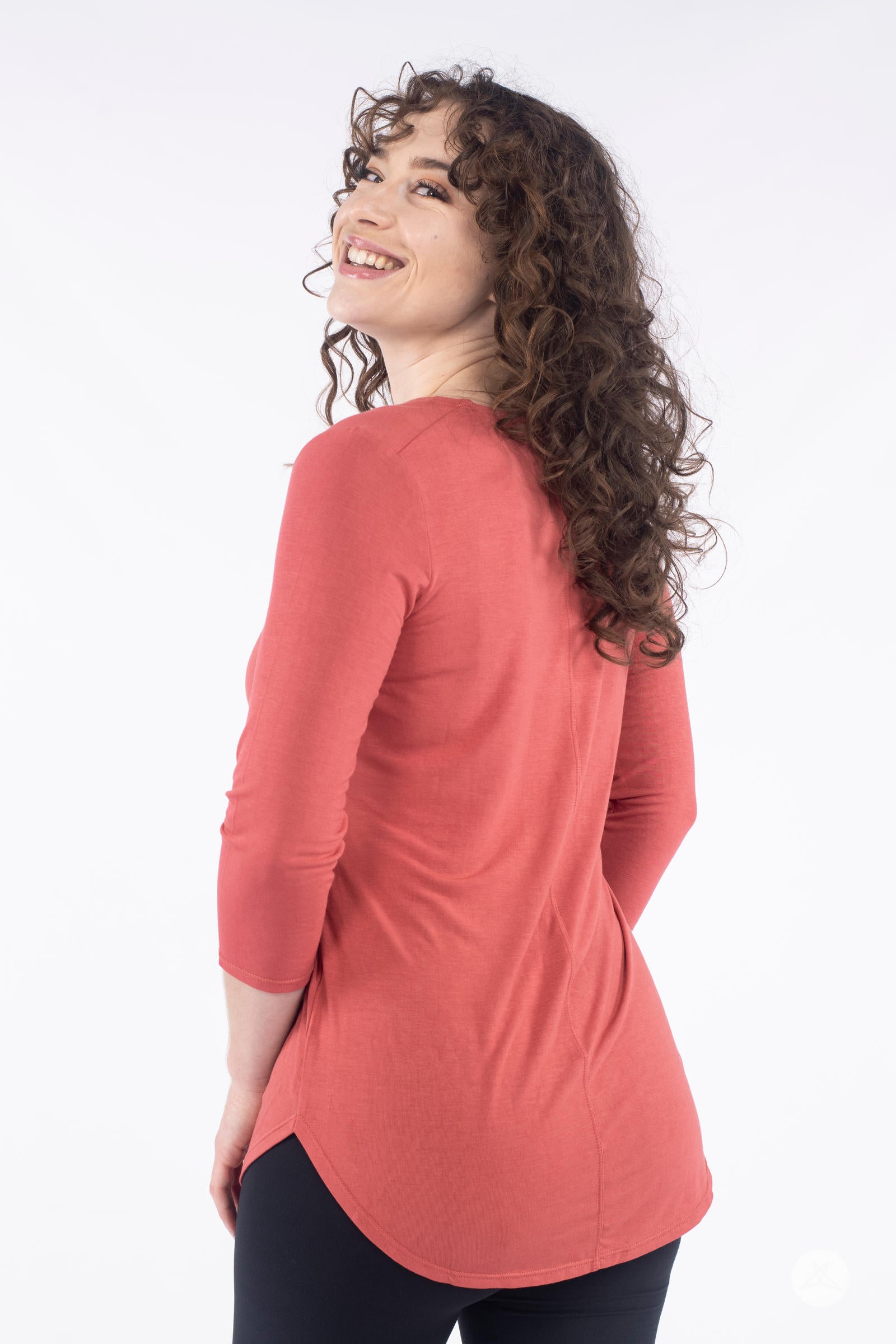 Classic 3/4 Tee by SweetLegs Canada in warm coral with high-low hem on smiling model back view