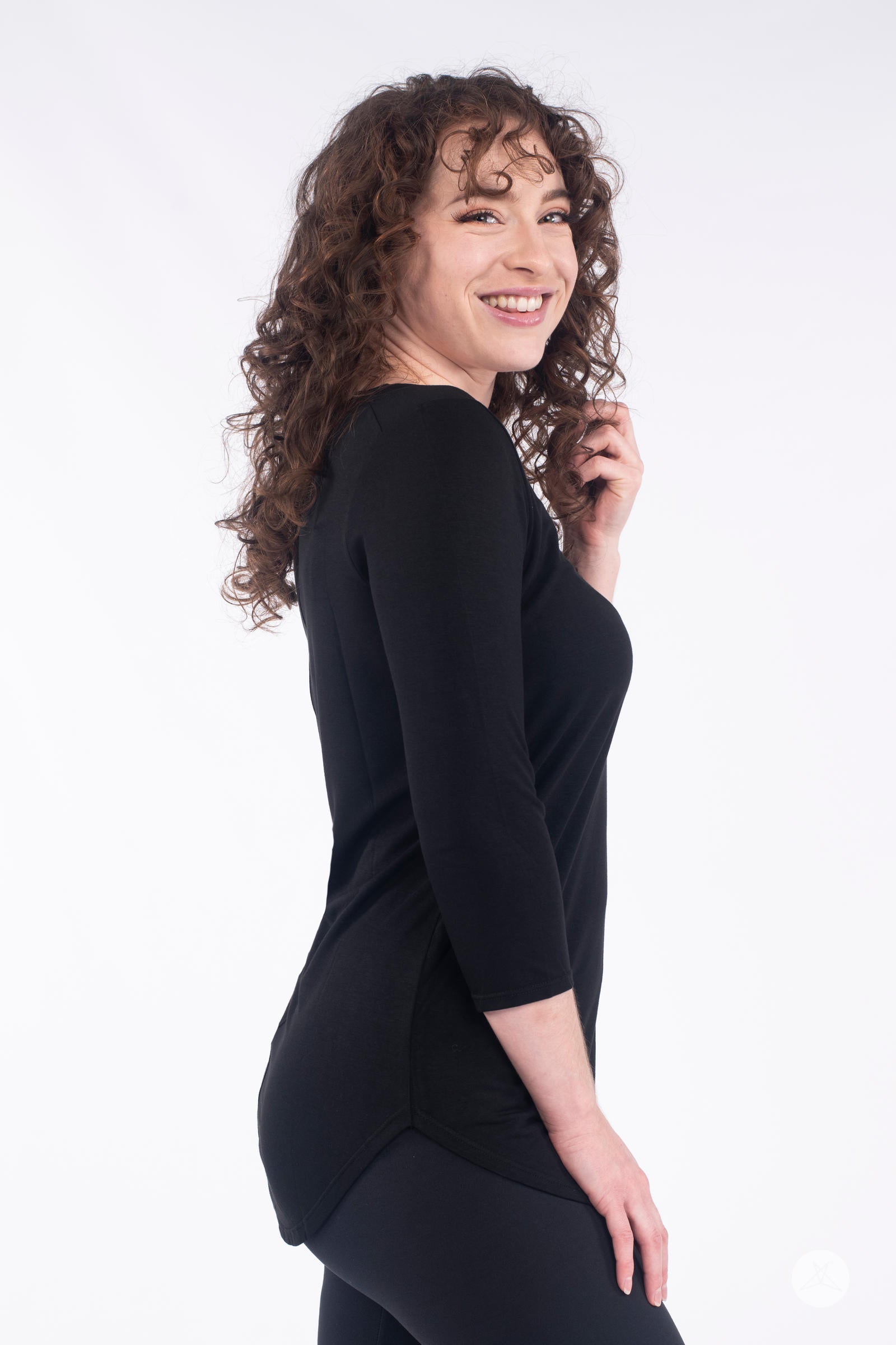 Classic 3/4 Tee by SweetLegs Canada in black with fitted 3/4 sleeves and curved hem on smiling model side view