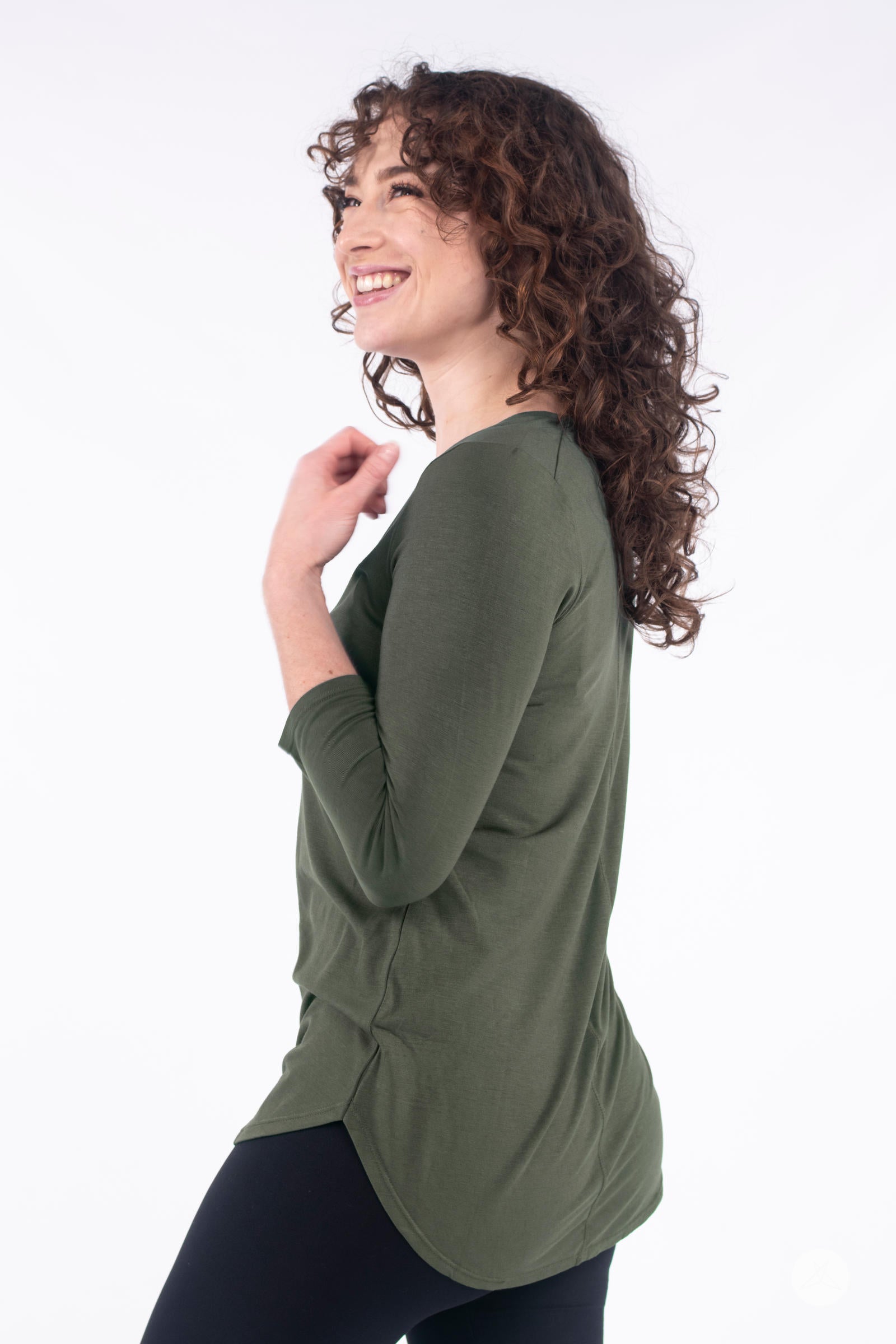 Classic 3/4 Tee by SweetLegs Canada in olive green with curved hem and fitted three-quarter sleeves on smiling model