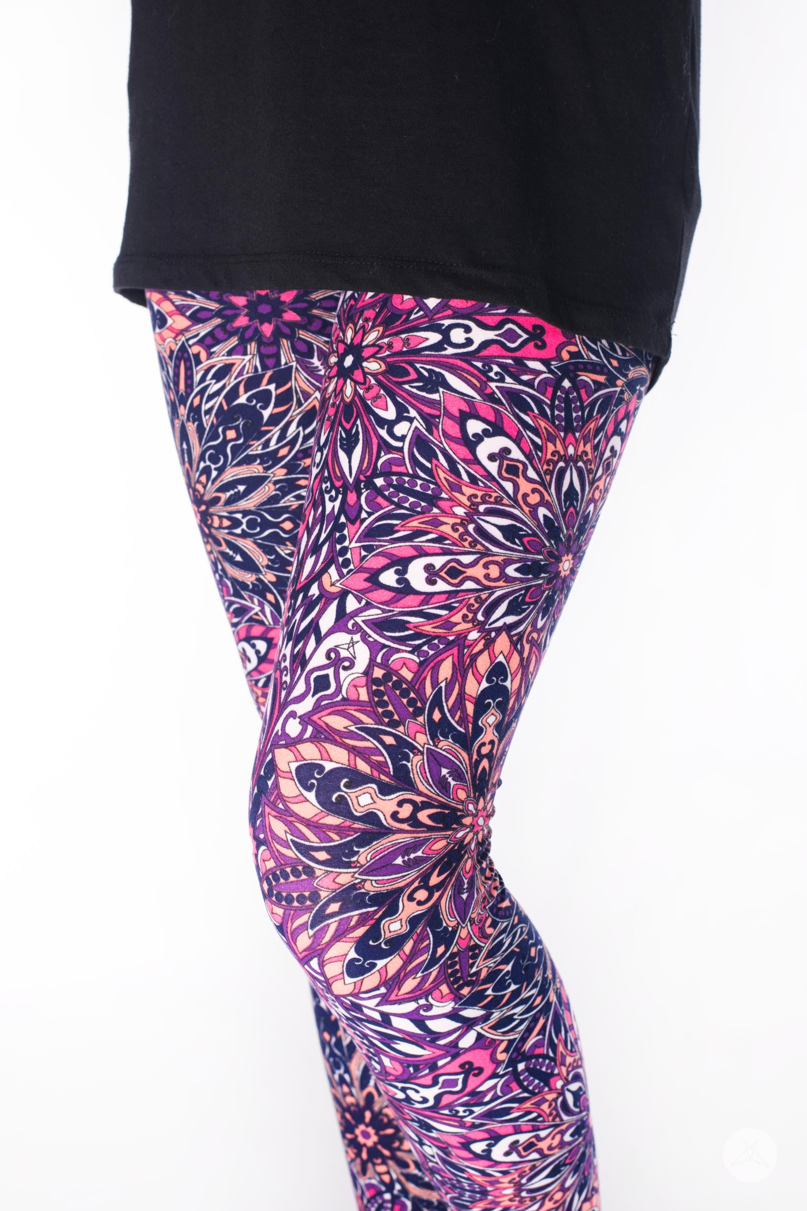 Close-up of SweetLegs Bohemian Beauty Kids leggings featuring intricate purple and coral floral patterns on a child’s legs