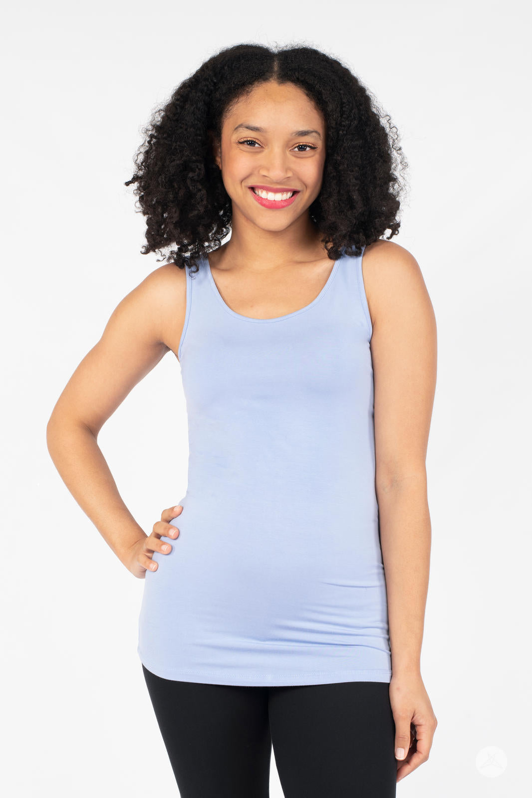 Smiling woman wearing SweetLegs Canada Classic Layering Tank in light blue with a smooth, soft, form-fitting style on white background