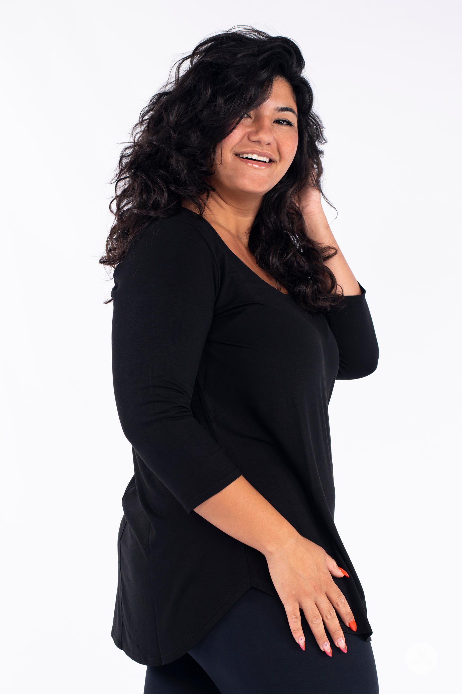 Classic 3/4 Tee by SweetLegs Canada in black with scoop neckline and relaxed fit on smiling model side view