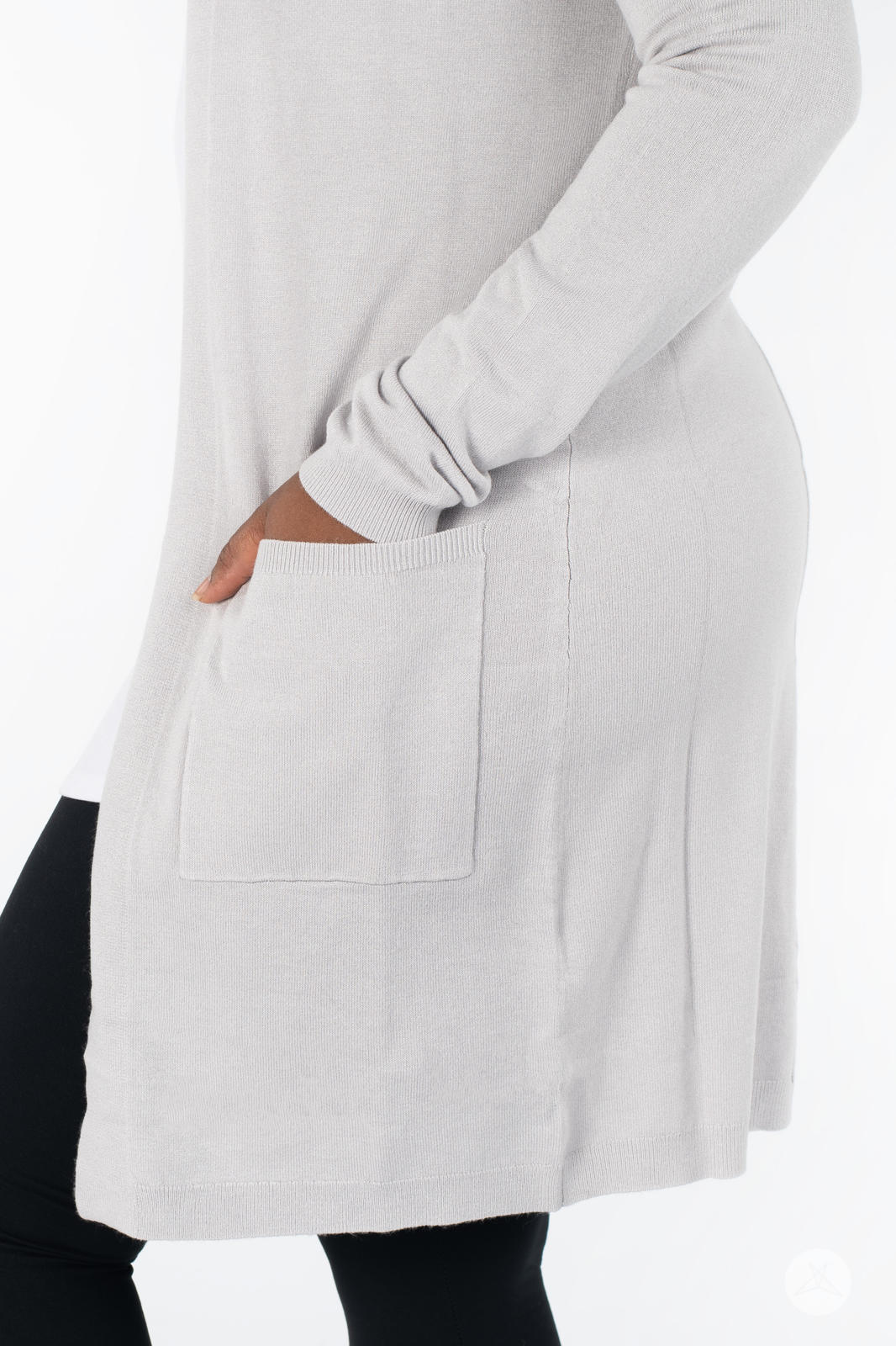 Close-up of model’s hand in patch pocket on light grey Spring Cardigan by SweetLegs Canada
