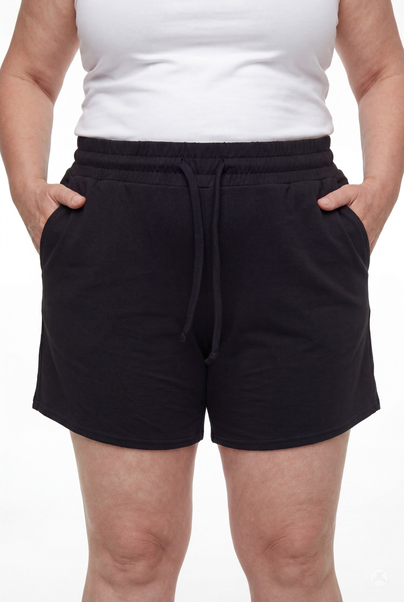 Front view of person wearing black Lounge Shorts by SweetLegs with elastic waistband and drawstring pockets