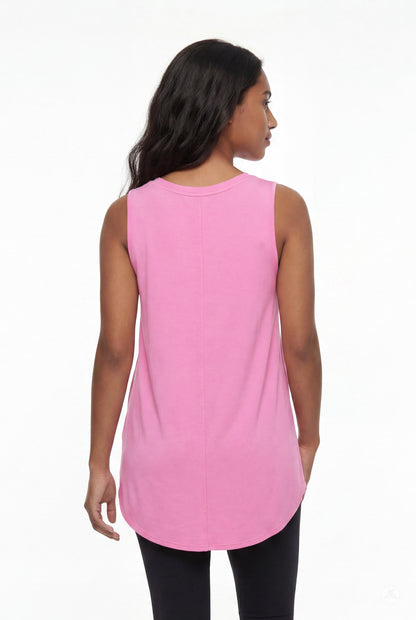 Woman seen from behind wearing SweetTops High Neck Swing Tank in pink with sleeveless cut and relaxed silhouette