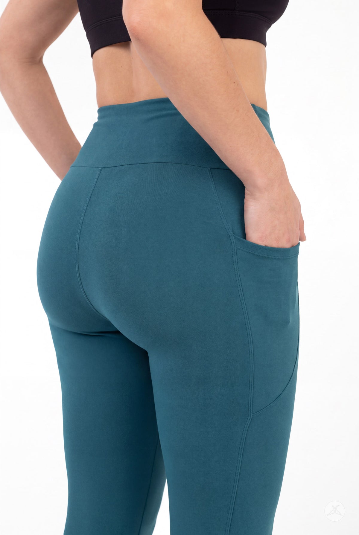 SweetLegs Deep Teal High-Waisted Pocket Leggings viewed from behind with a hand in the side pocket