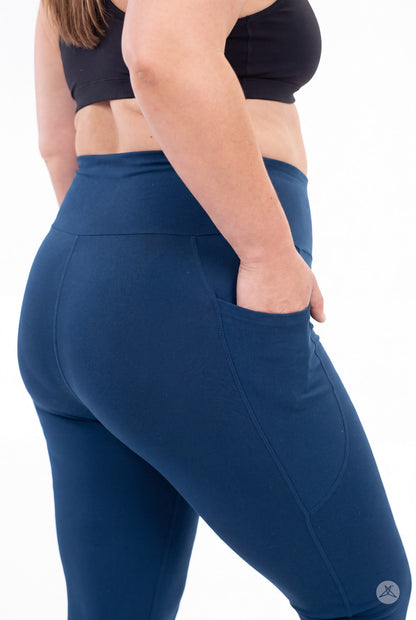 SweetLegs Still Water High-Waisted Pocket Leggings shown from behind with a hand in the side pocket