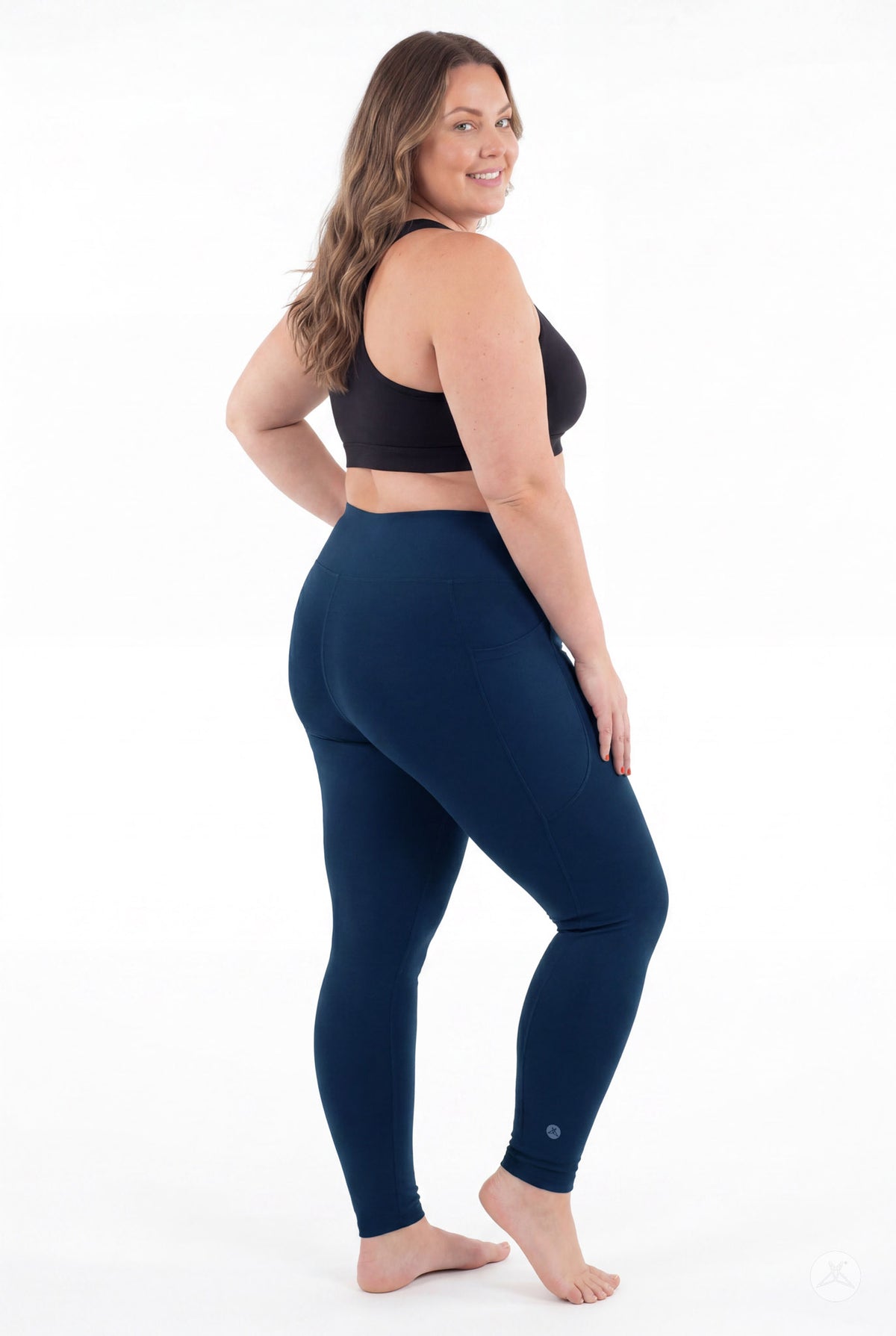 SweetLegs Still Water High-Waisted Pocket Leggings on a smiling barefoot model viewed from behind