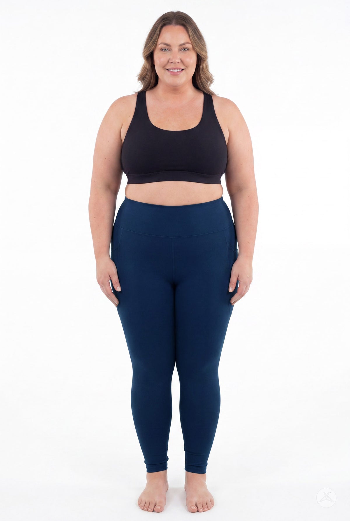 SweetLegs Still Water High-Waisted Pocket Leggings worn by a smiling model in a black top barefoot