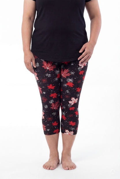 Plus size model in SweetLegs Maple Mood Crops featuring red and white leaf patterns with black top barefoot