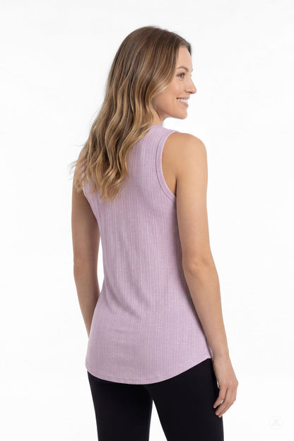 Woman wearing SweetTops The Soft Ribbed Tank in lilac, shown from the back with black leggings and smiling
