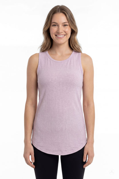 Smiling model wearing SweetTops The Soft Ribbed Tank in lilac with black leggings, front view