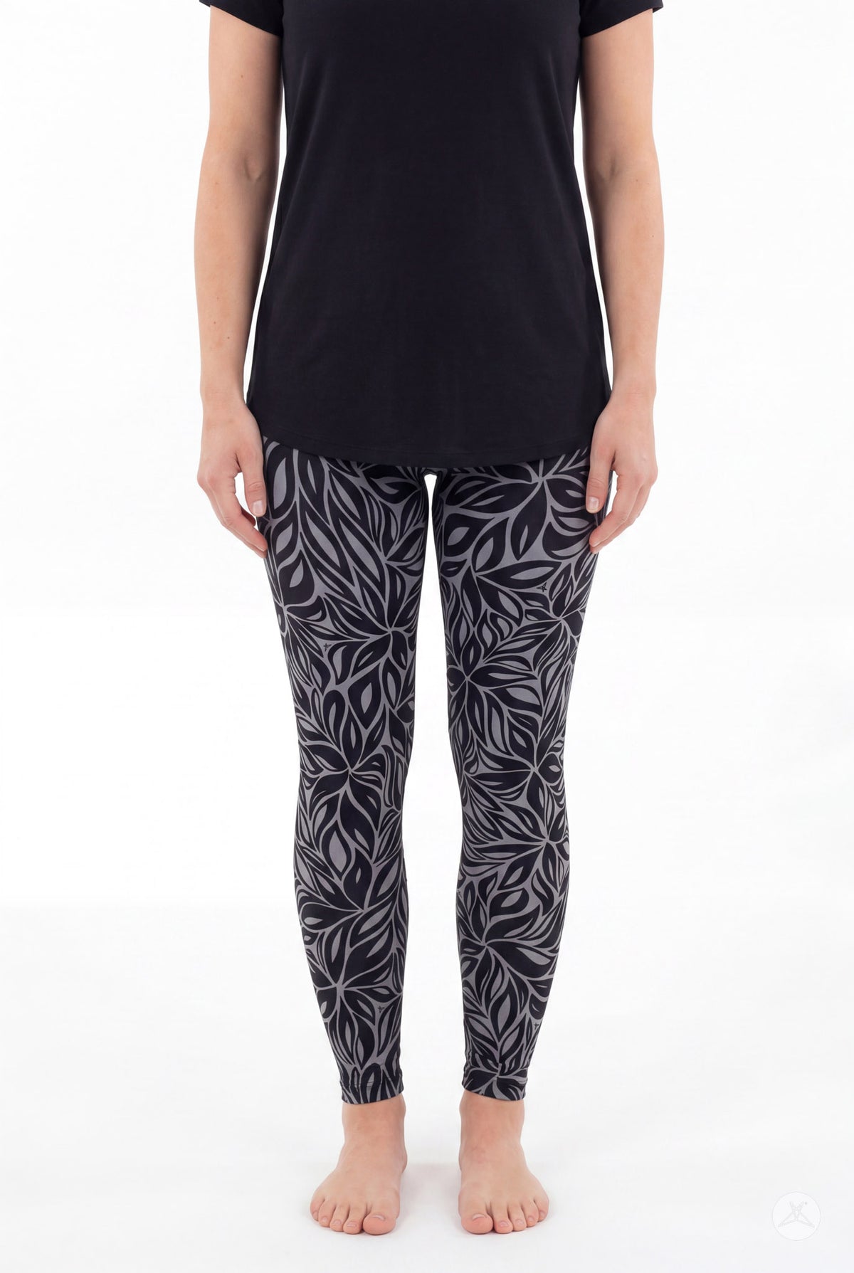 SweetLegs Shadow Petal Leggings modeled in a black and gray leafy botanical print
