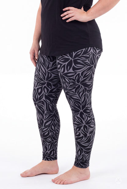SweetLegs Shadow Petal Leggings featuring a dark gray leafy pattern on a model