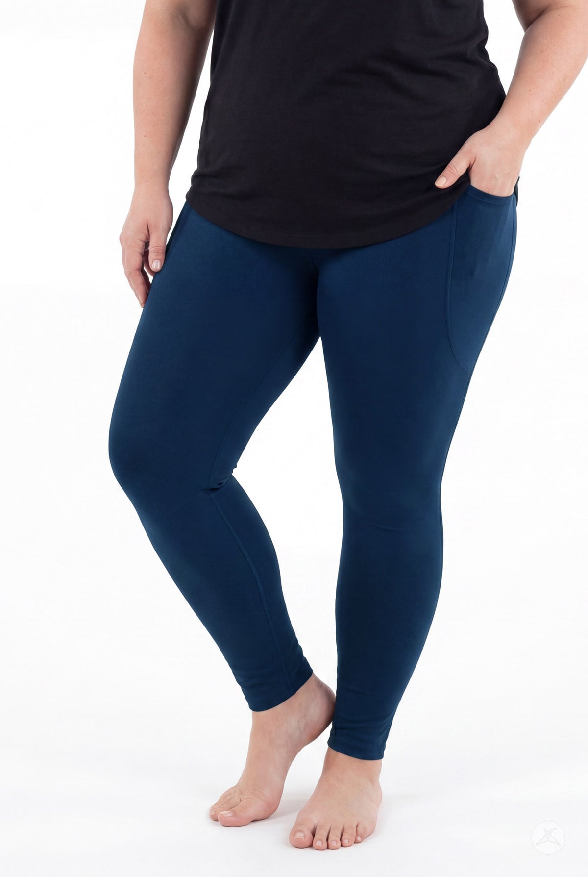 SweetLegs Still Water Pocket Leggings in navy blue on a model with side pockets