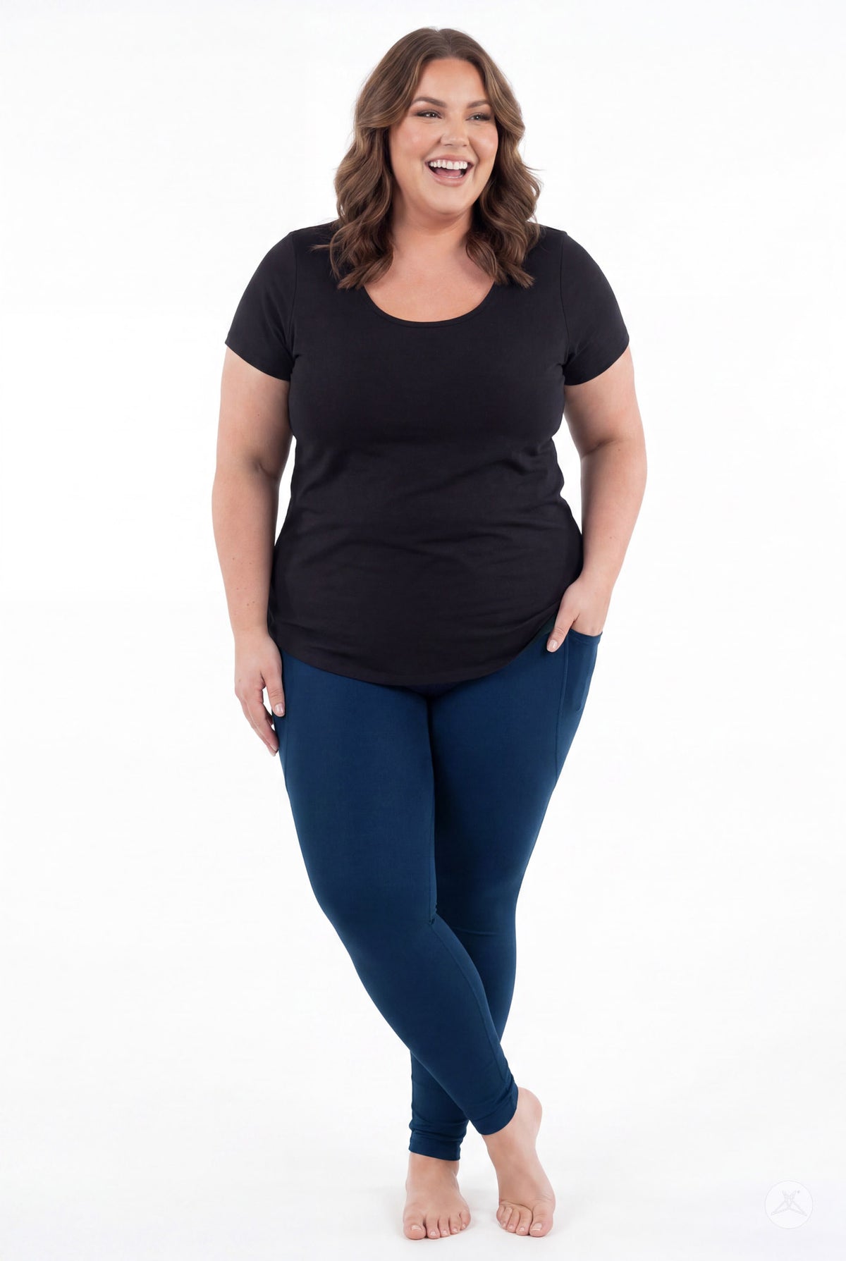 SweetLegs Still Water Pocket Leggings in navy blue worn by a smiling model