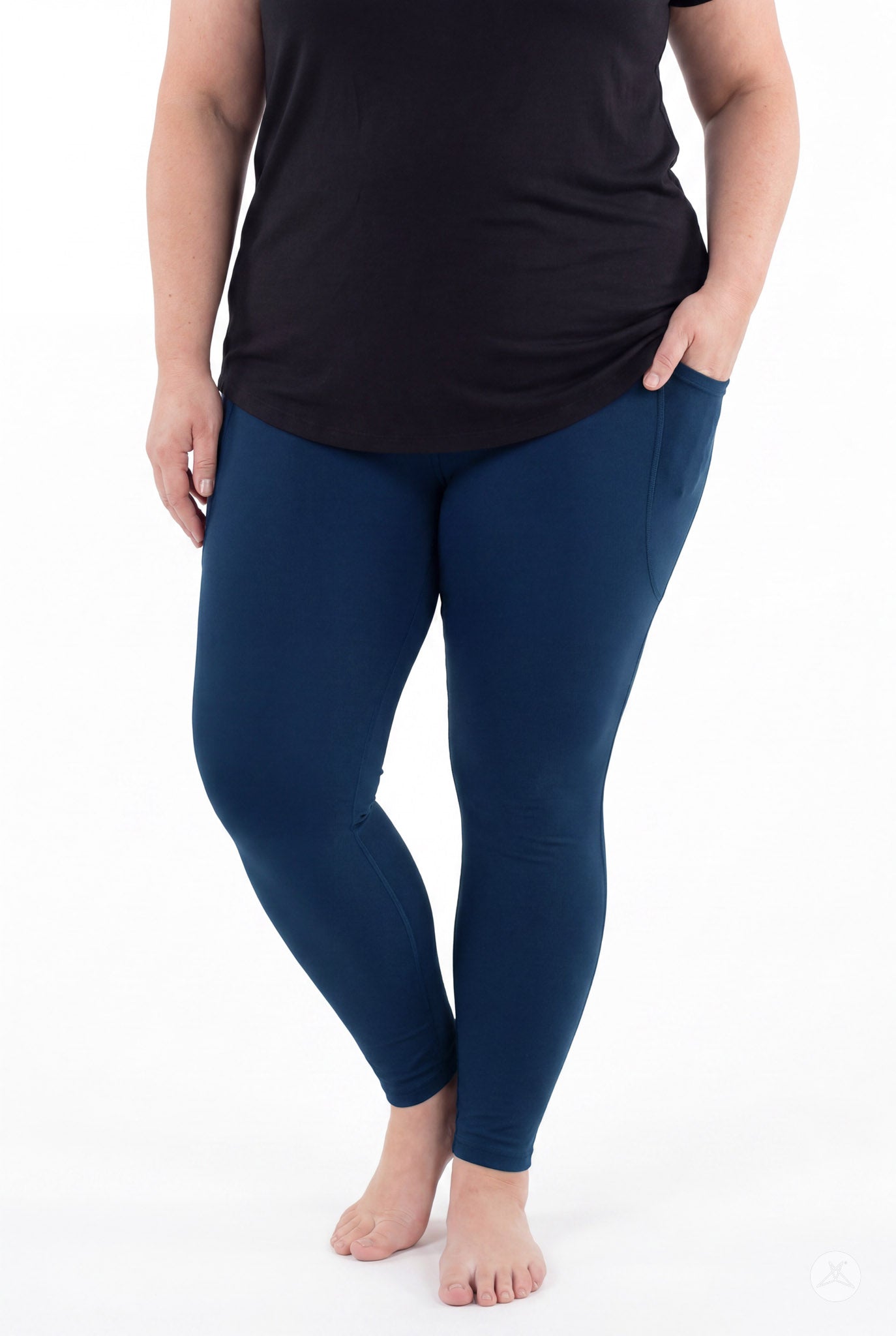 SweetLegs Still Water Pocket Leggings in navy blue with side pockets on a model