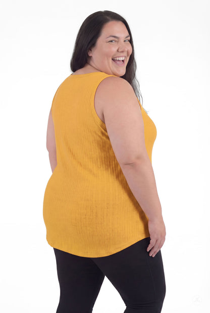 Plus size model wearing The Soft Ribbed Tank in marigold by SweetTops showing back view with ribbed fabric texture